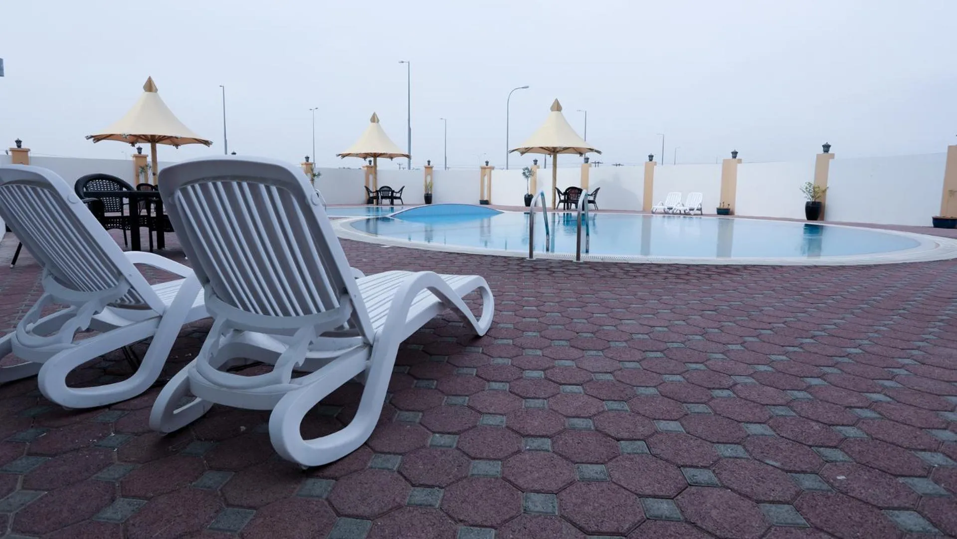 Swimming pool in Remas Hotel Suites - Al Khoudh, Seeb, Muscat