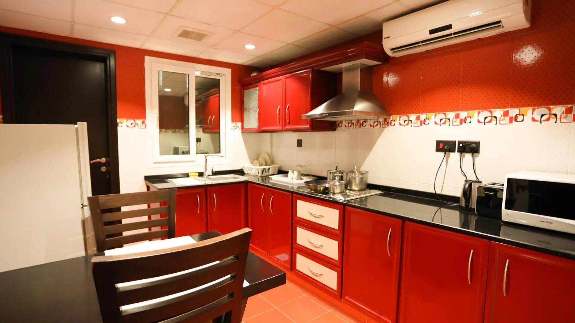 Kitchen or kitchenette in Remas Hotel Suites - Al Khoudh, Seeb, Muscat