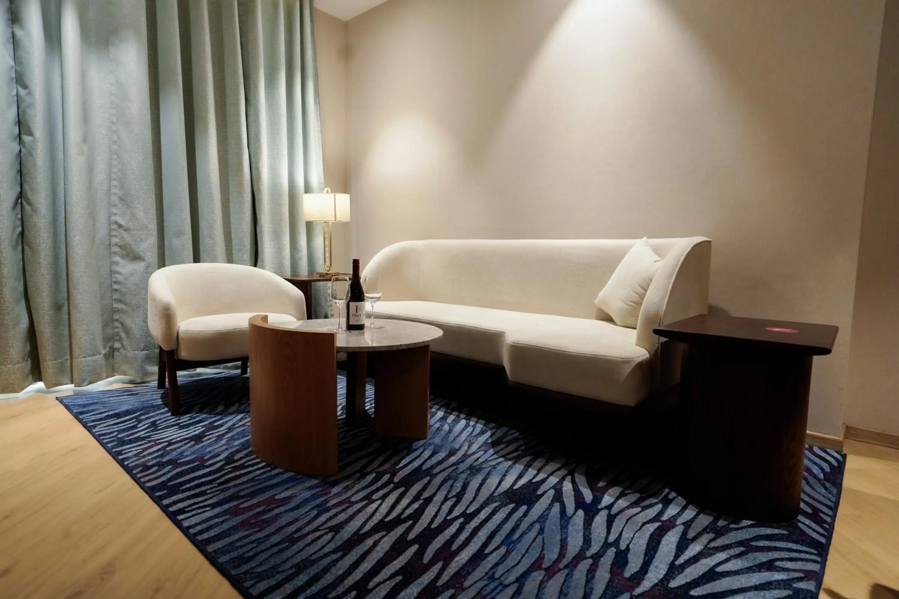 Living room in Ramada Encore by Wyndham Chandigarh Zirakpur