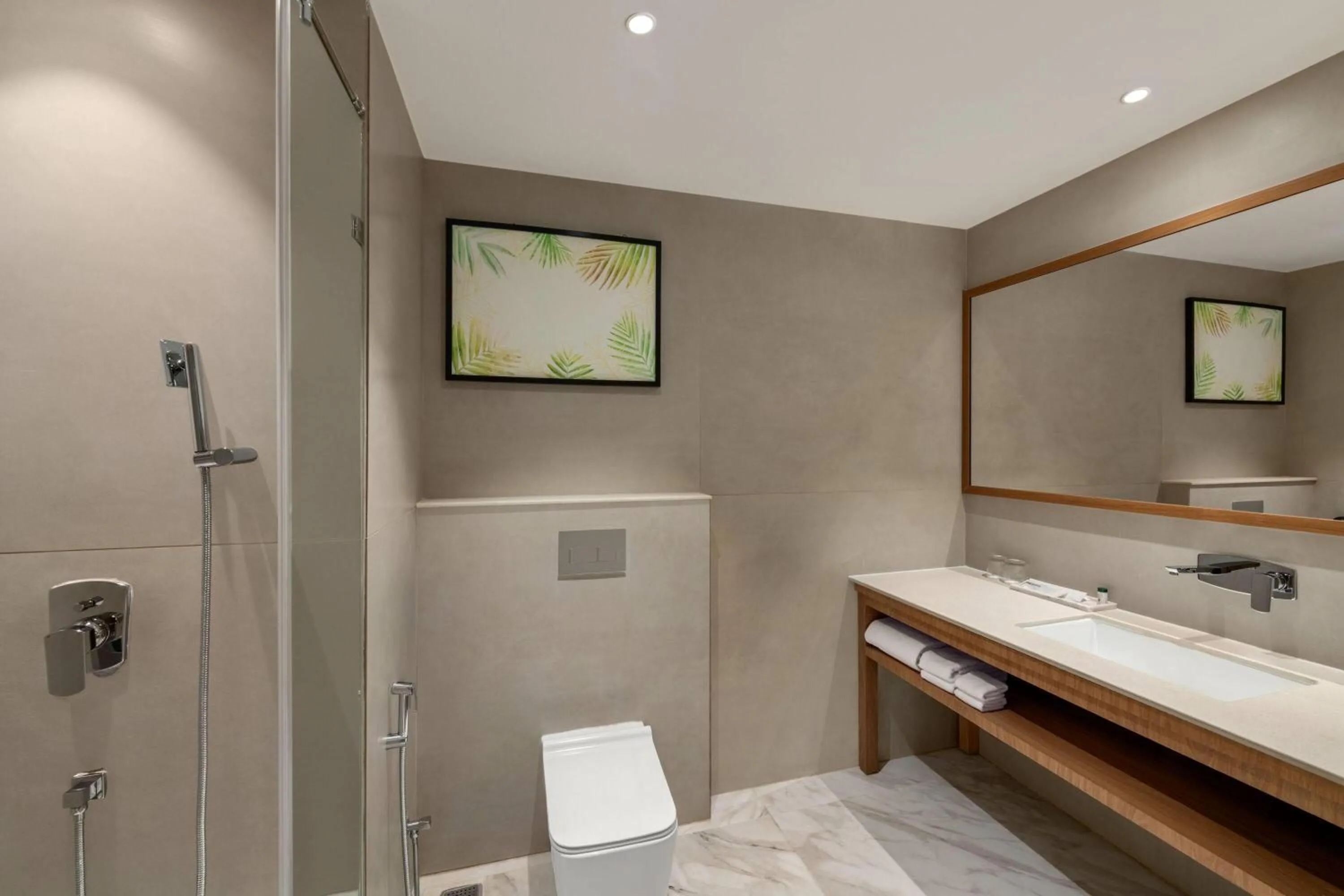 Bathroom, Bed in Ramada by Wyndham Ranchi