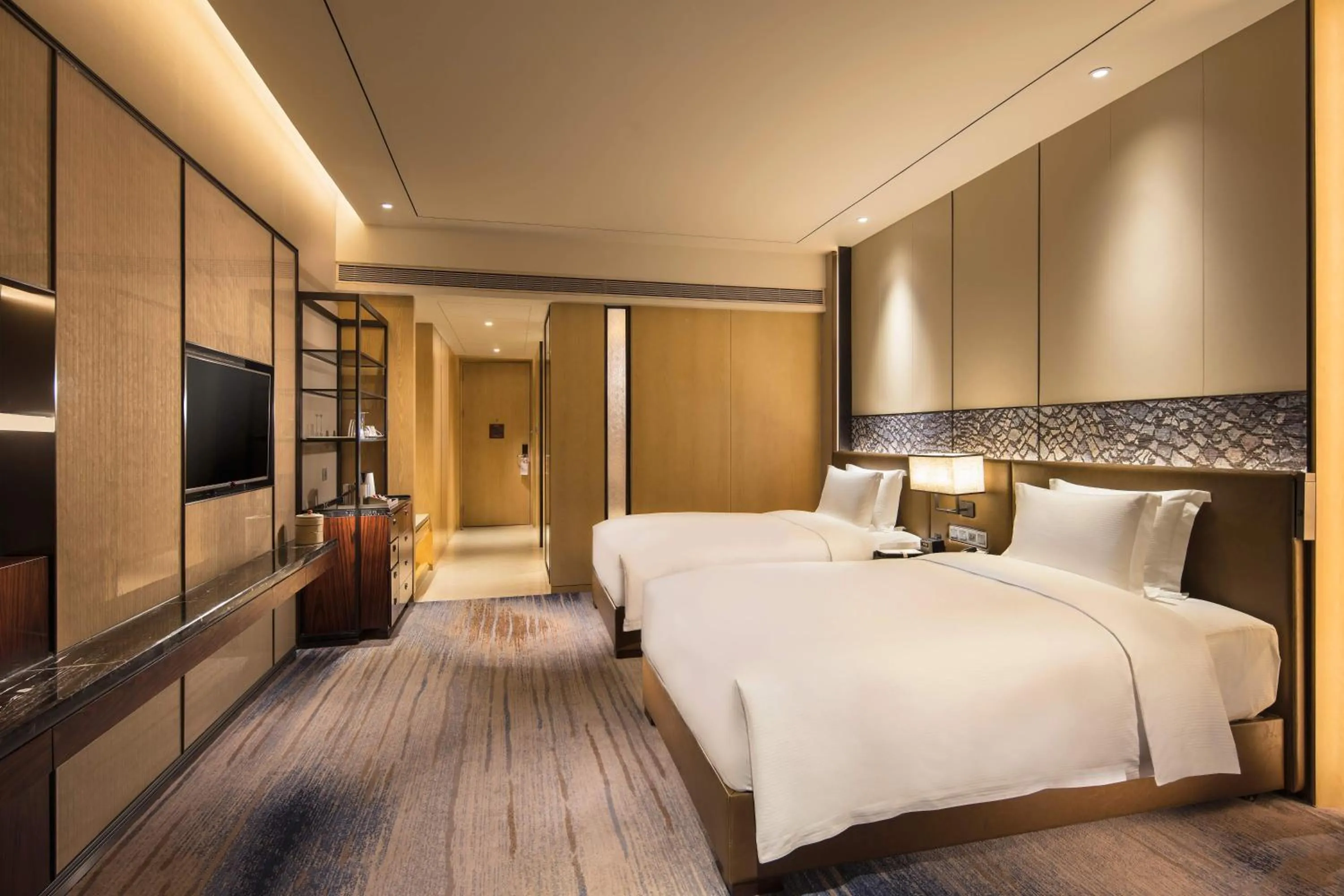 Bed in DoubleTree by Hilton Hotel Anshun