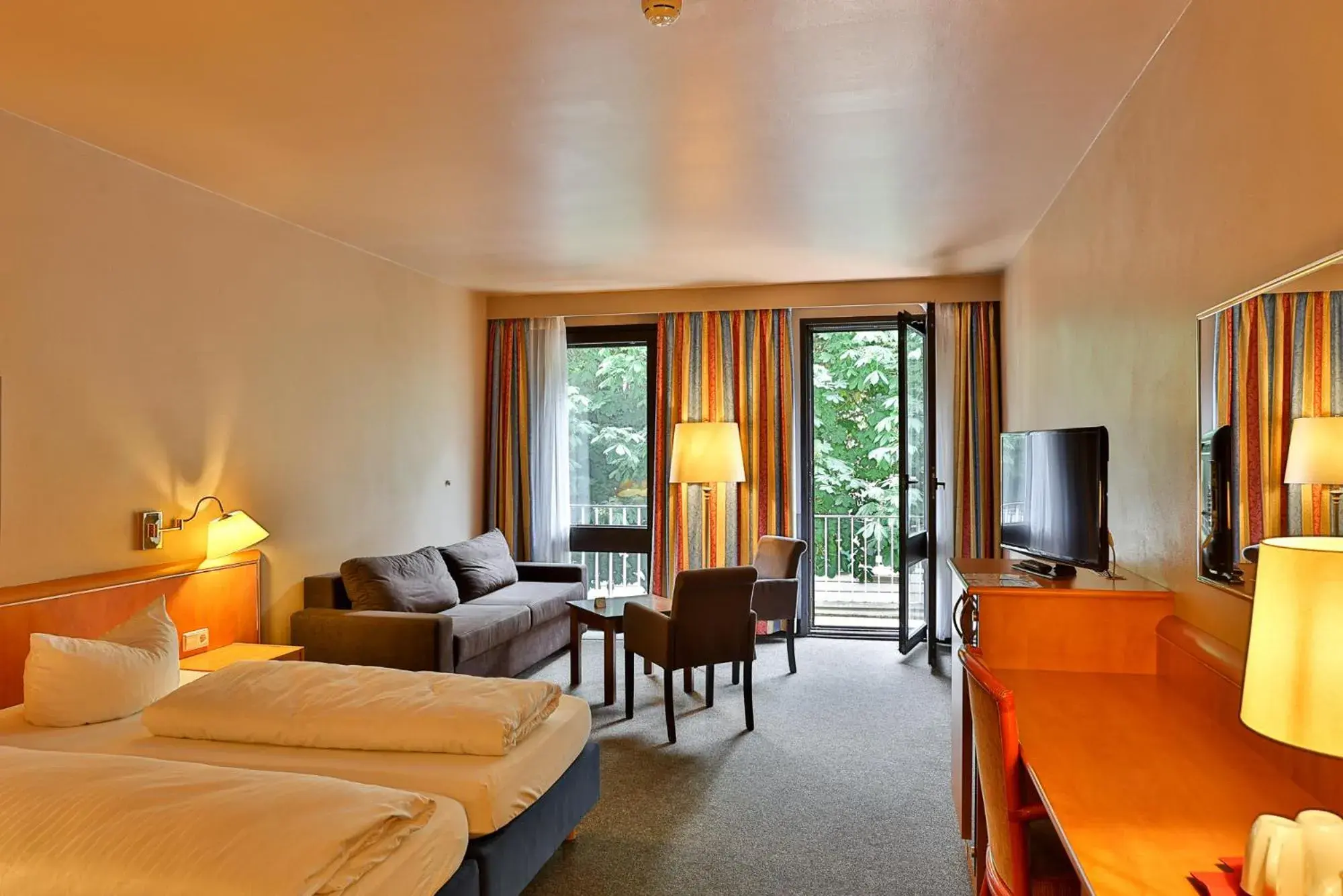 Deluxe Double Room with Balcony in Hotel Quellenhof Deluxe Double Room with Balcony in Hotel Quellenhof