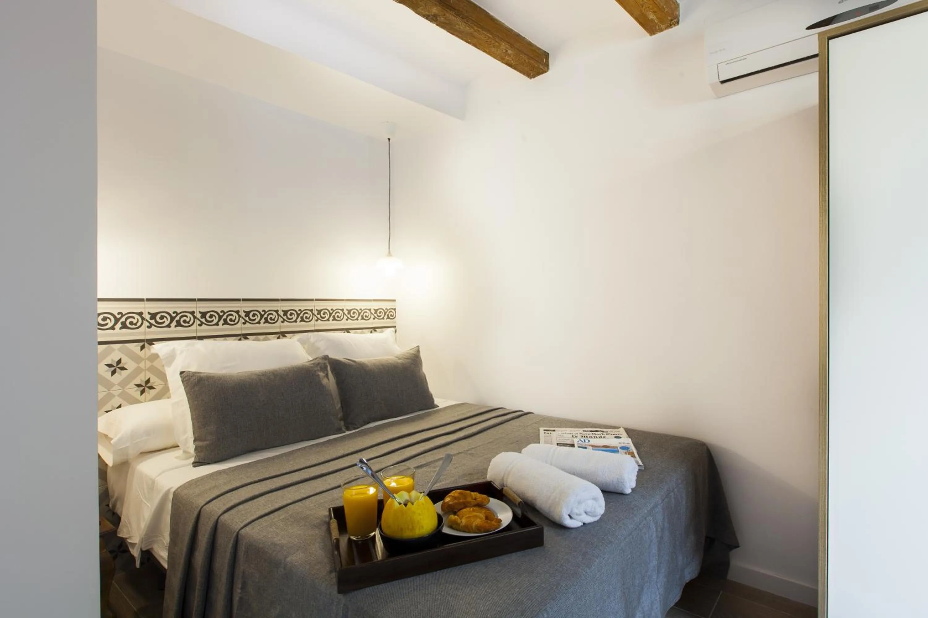 Bed in Aspasios Charming Flats