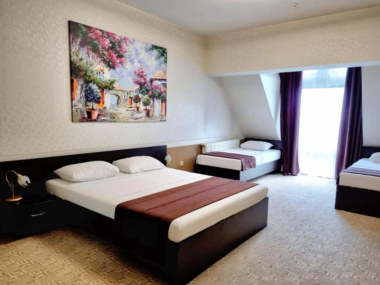 Bed in TipTop Hotel CITY CENTER