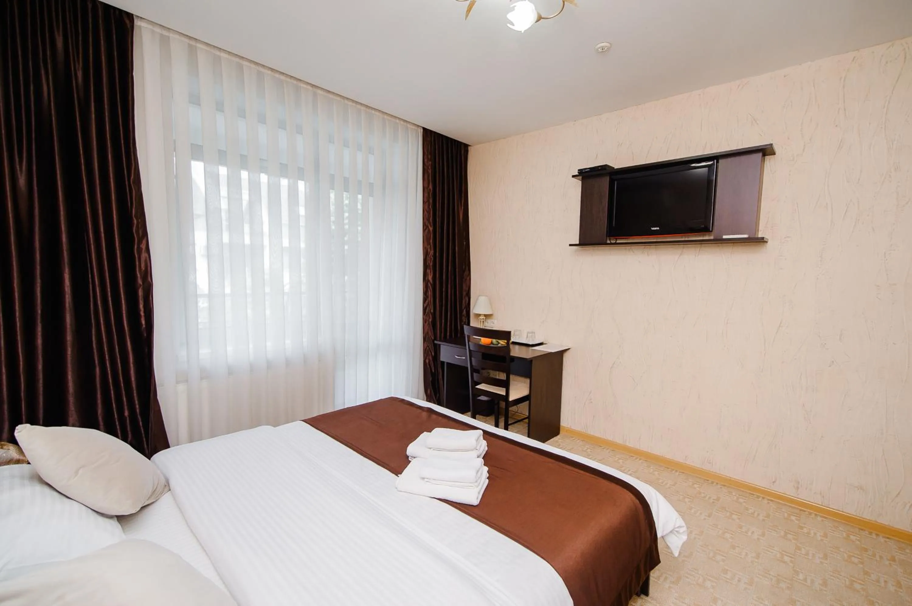 Photo of the whole room, Bed in TipTop Hotel CITY CENTER