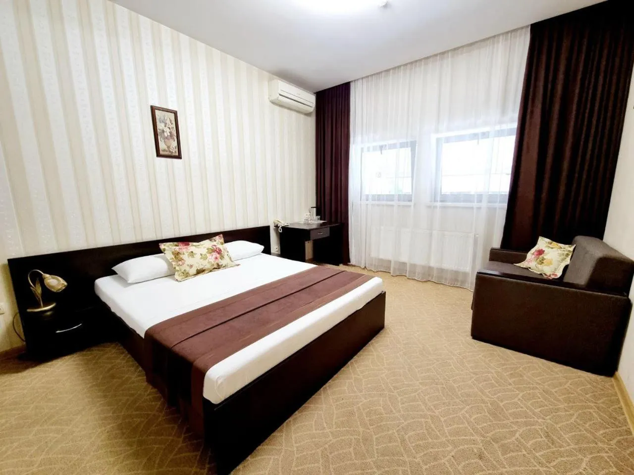 Living room, Bed in TipTop Hotel CITY CENTER