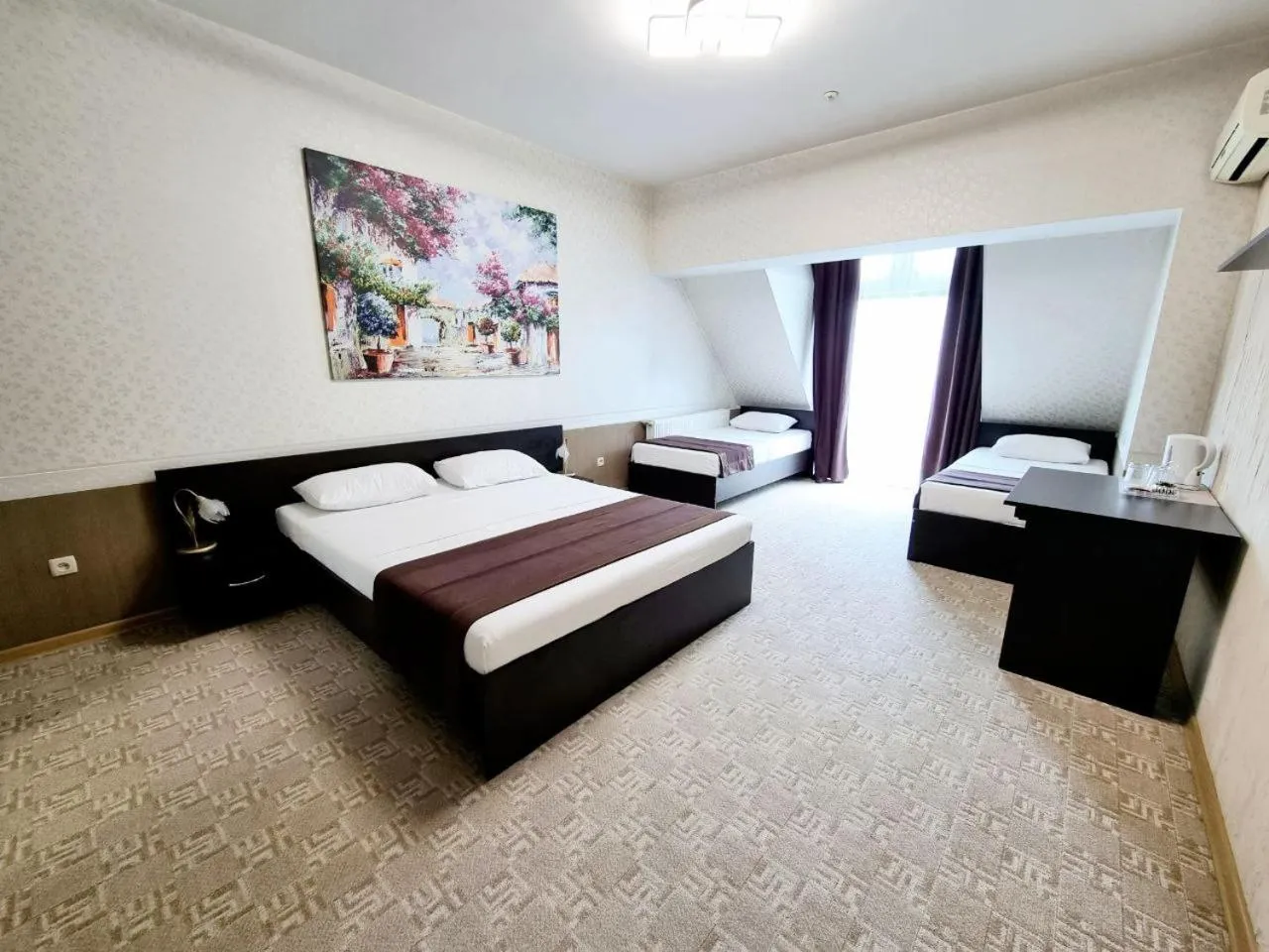 TV and multimedia, Bed in TipTop Hotel CITY CENTER