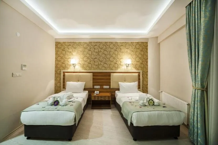 Bed in Almero Termal Spa Otel