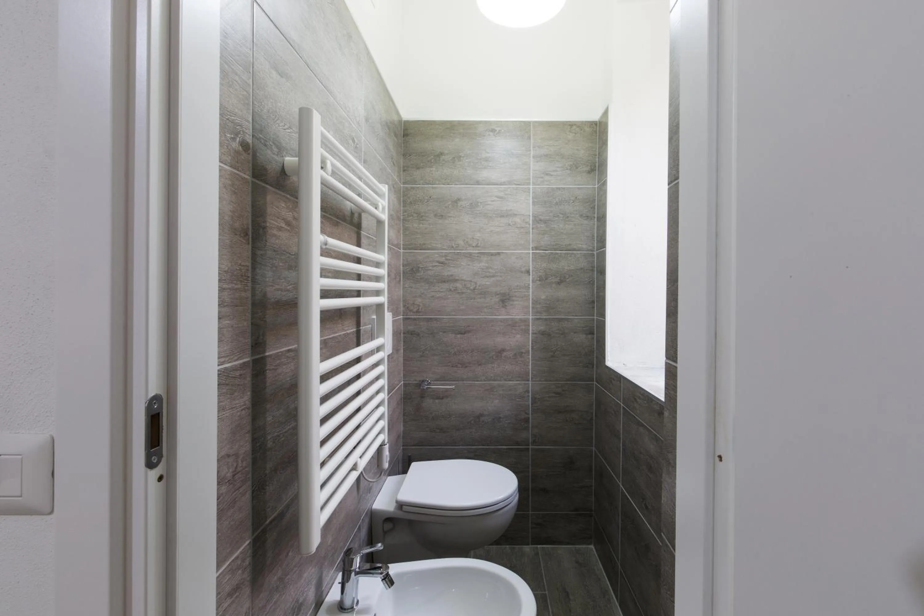 Bathroom in Affittacamere Le Farfalle