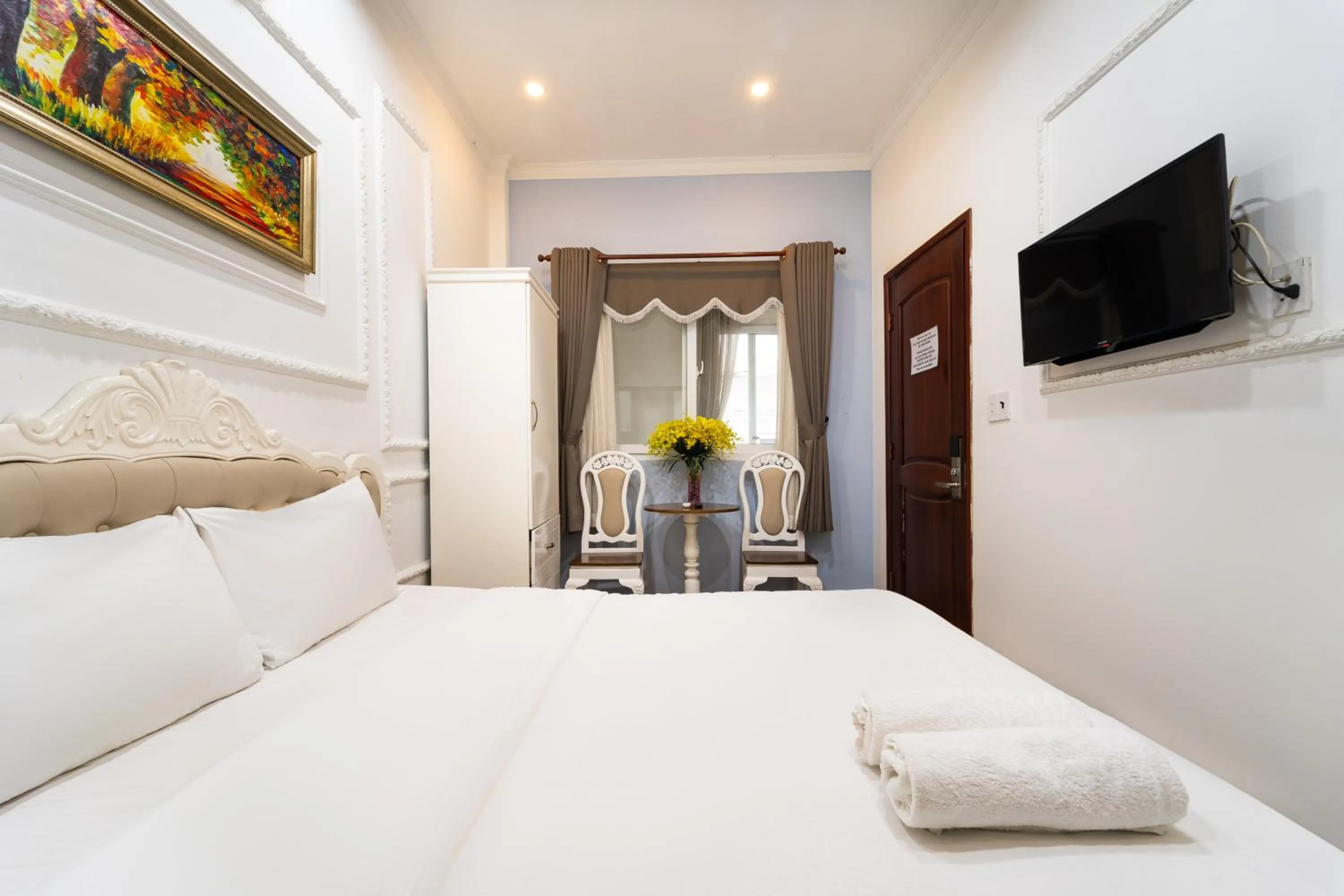 Communal lounge/ TV room, Bed in StayX Saigon Center