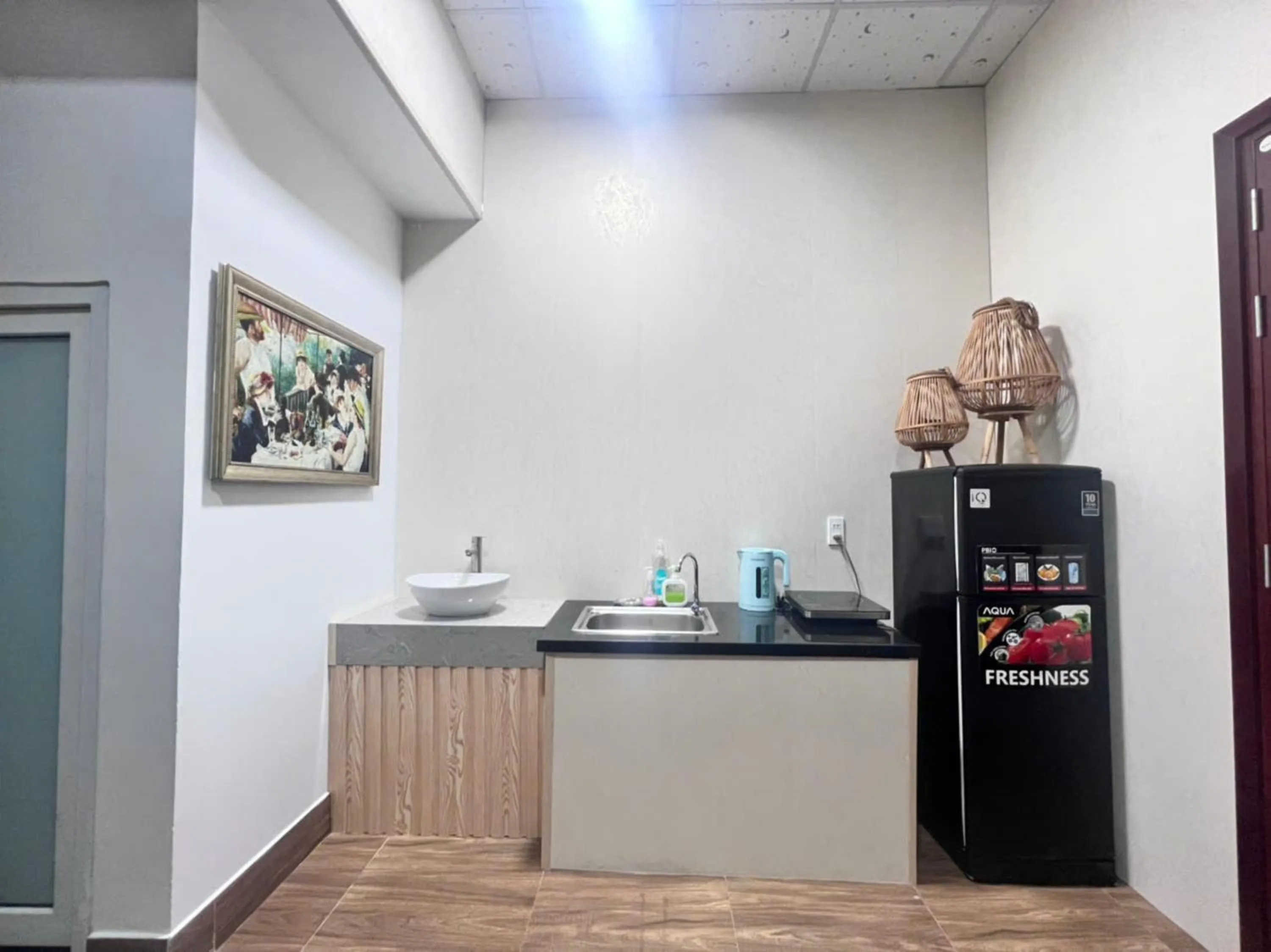 Kitchen or kitchenette in StayX Saigon Center
