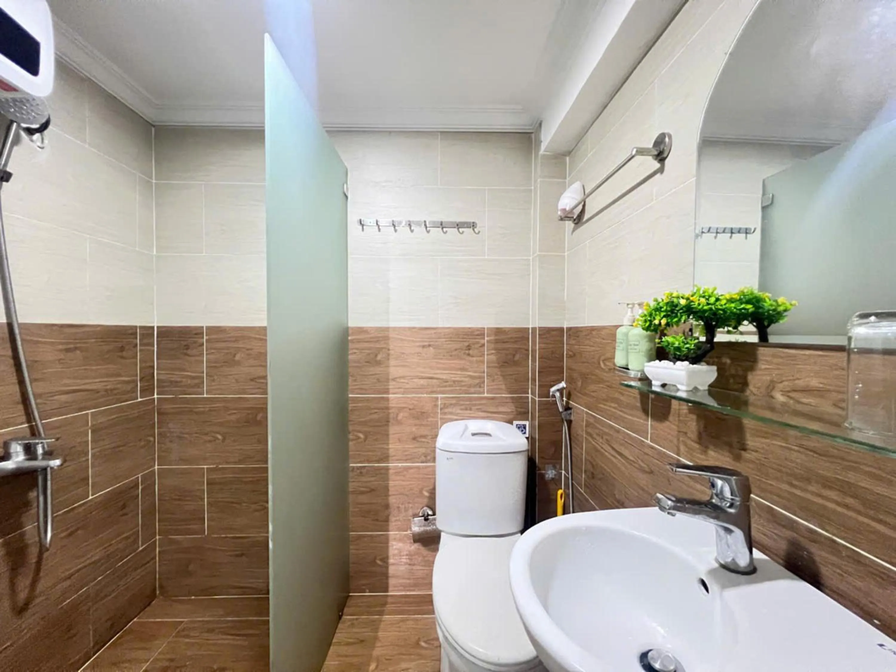 Shower in StayX Saigon Center