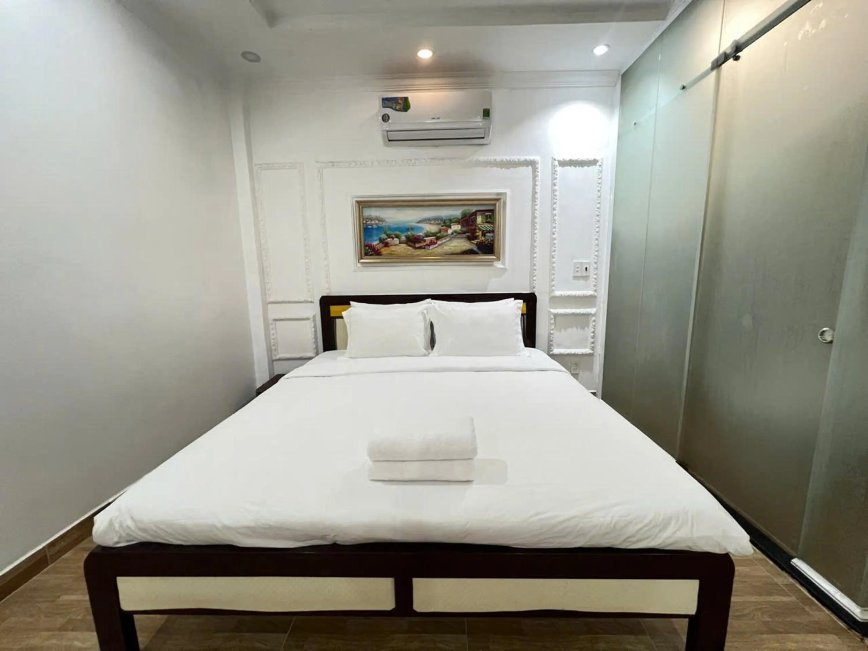 Photo of the whole room, Bed in StayX Saigon Center