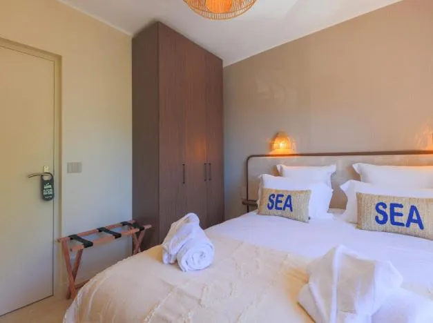 Photo of the whole room, Bed in Hôtel Lou Juan