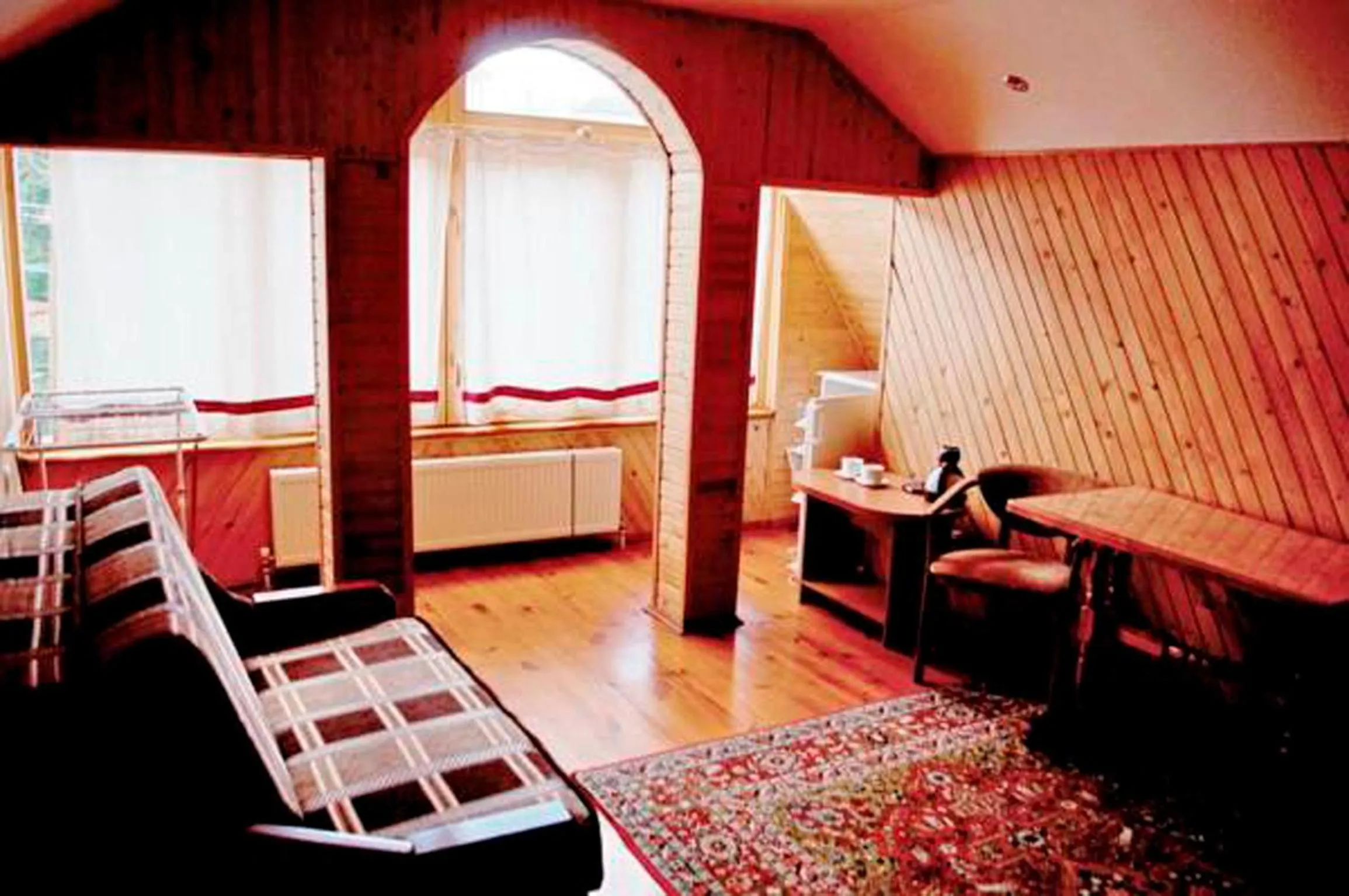 Living room, Bed in Malvy hotel