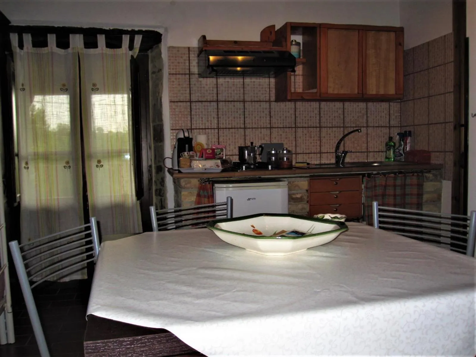 Kitchen or kitchenette in La Pietra Rara B&B