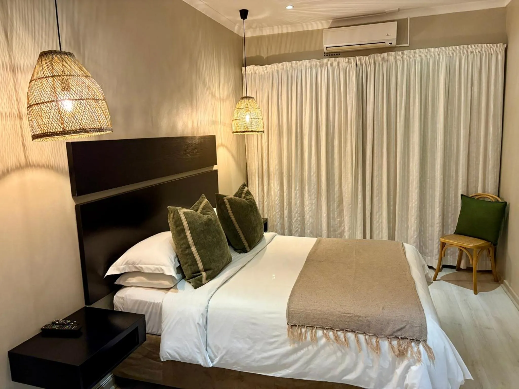 Bed in The Suburban Guest House