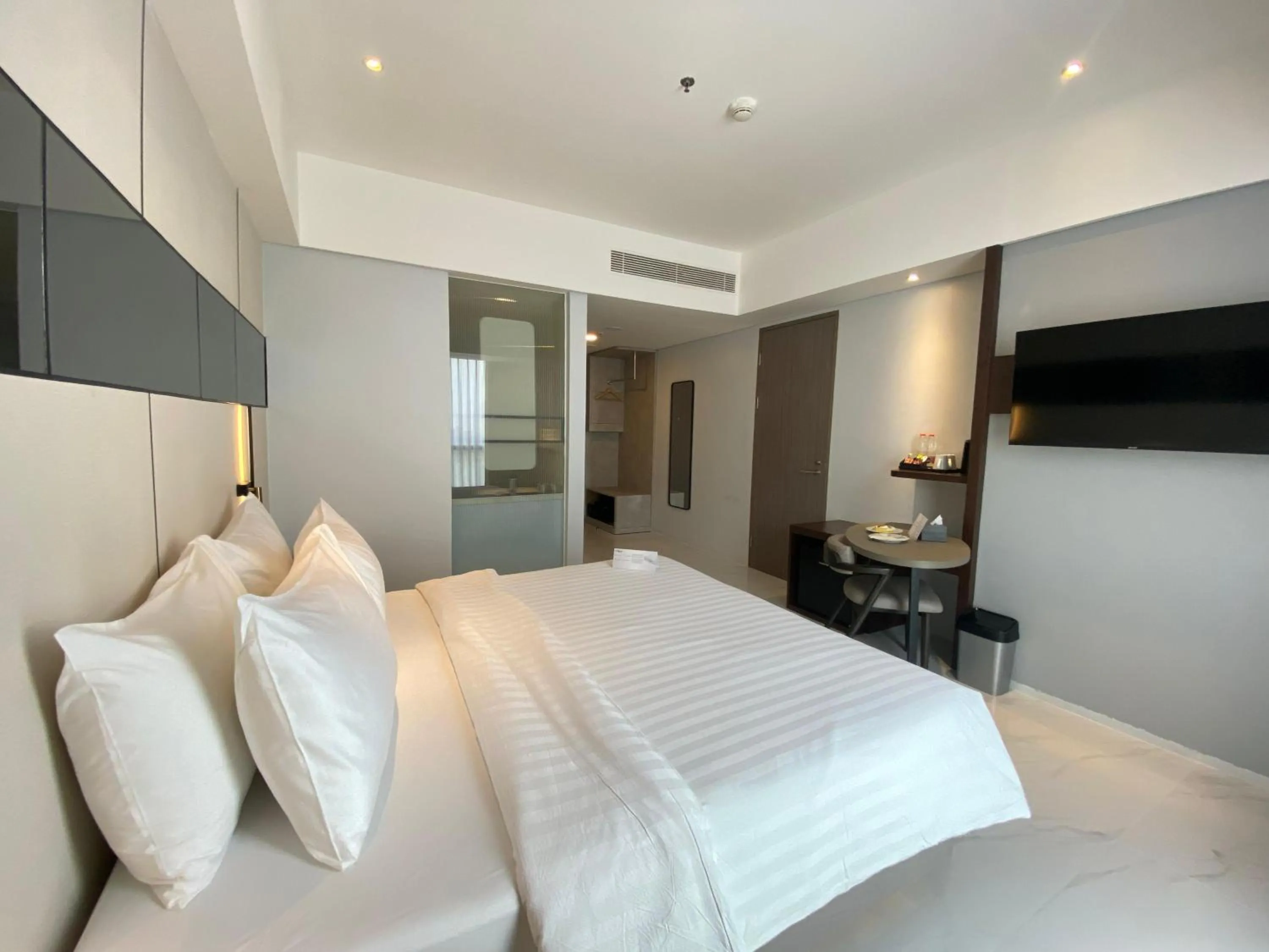Bed in Grand Whiz Hotel Praxis Surabaya