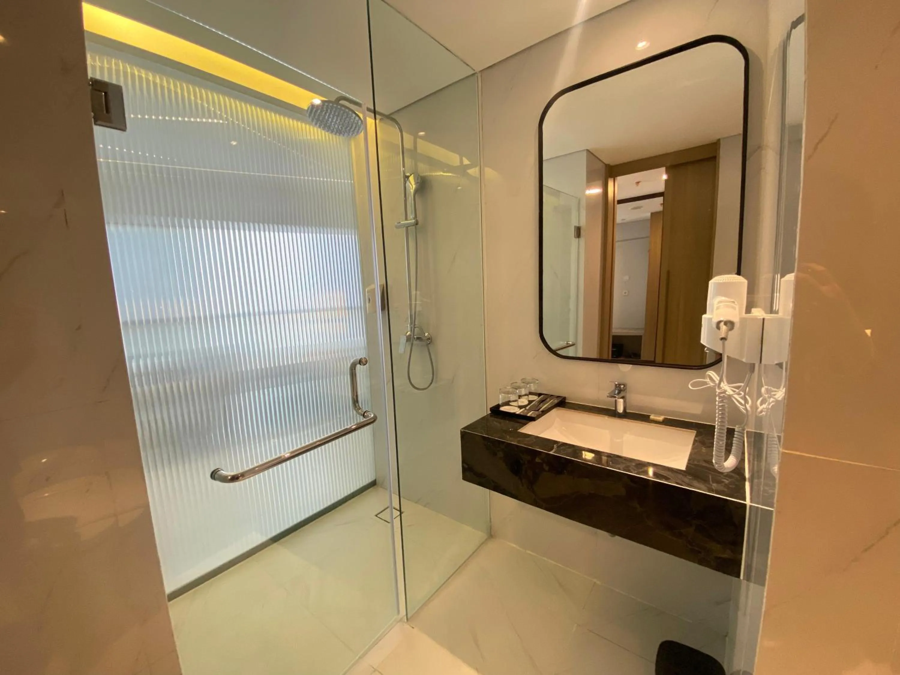 Bathroom in Grand Whiz Hotel Praxis Surabaya