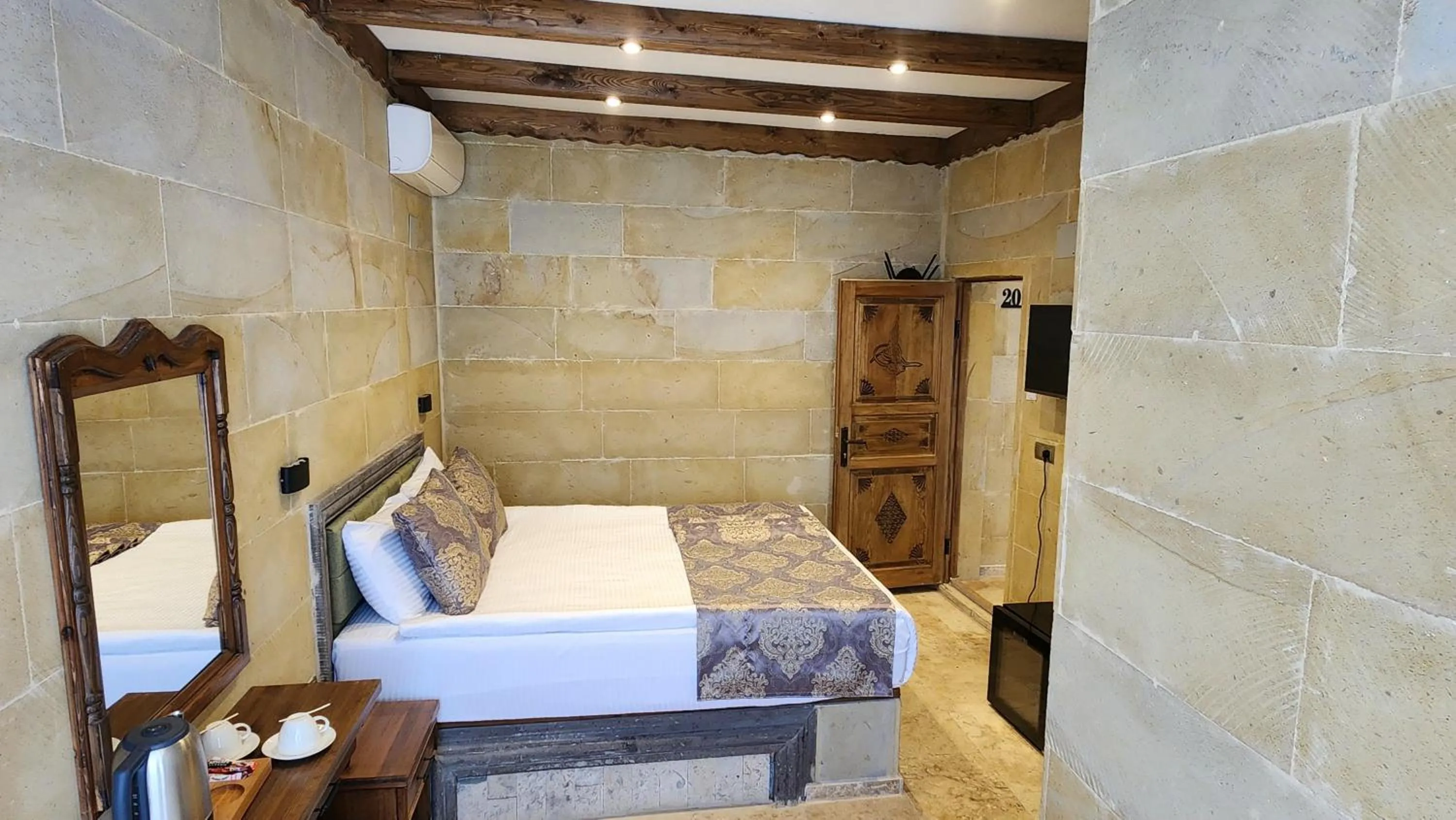 Bed in Capavista Cave House