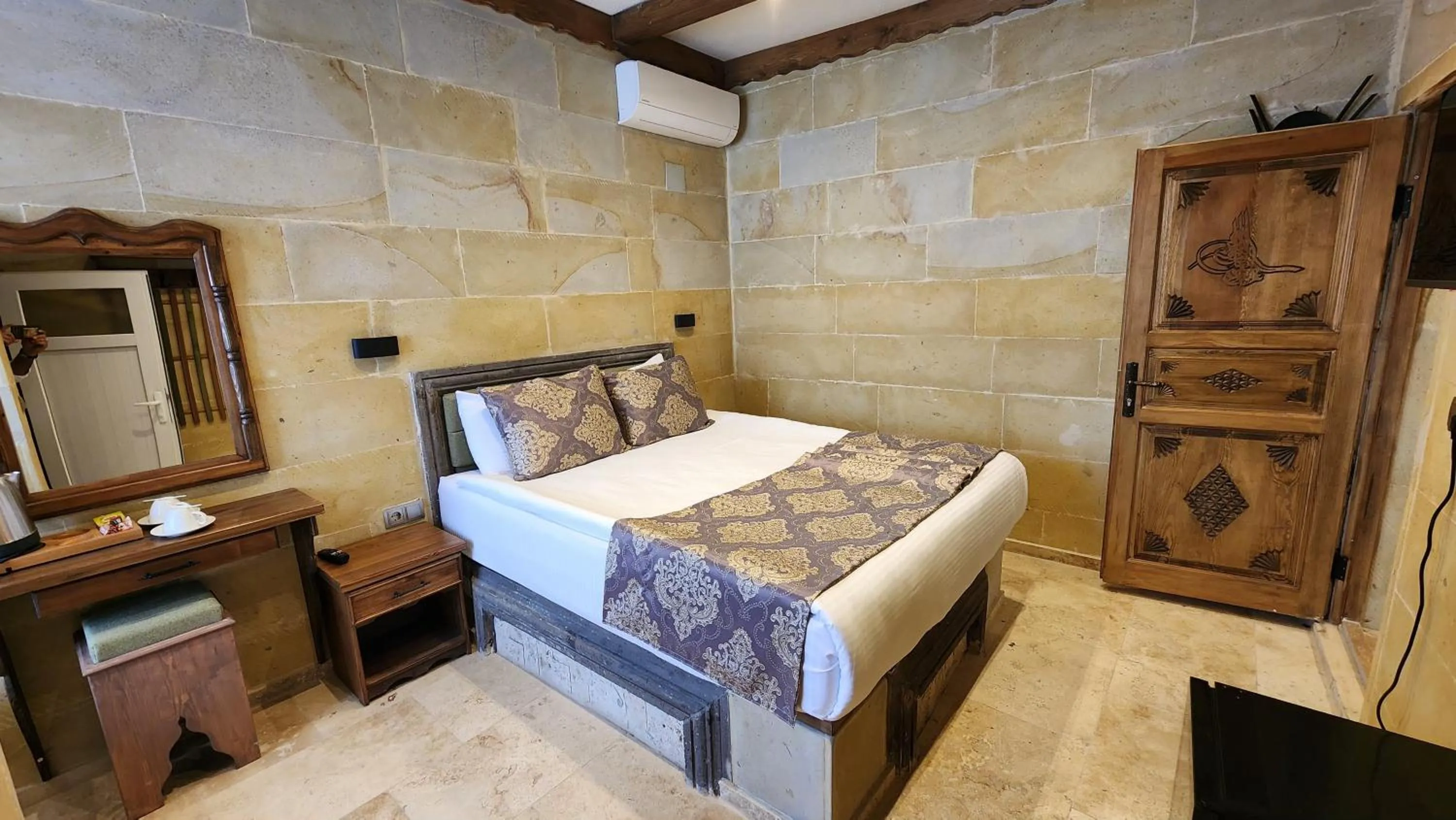 Bed in Capavista Cave House