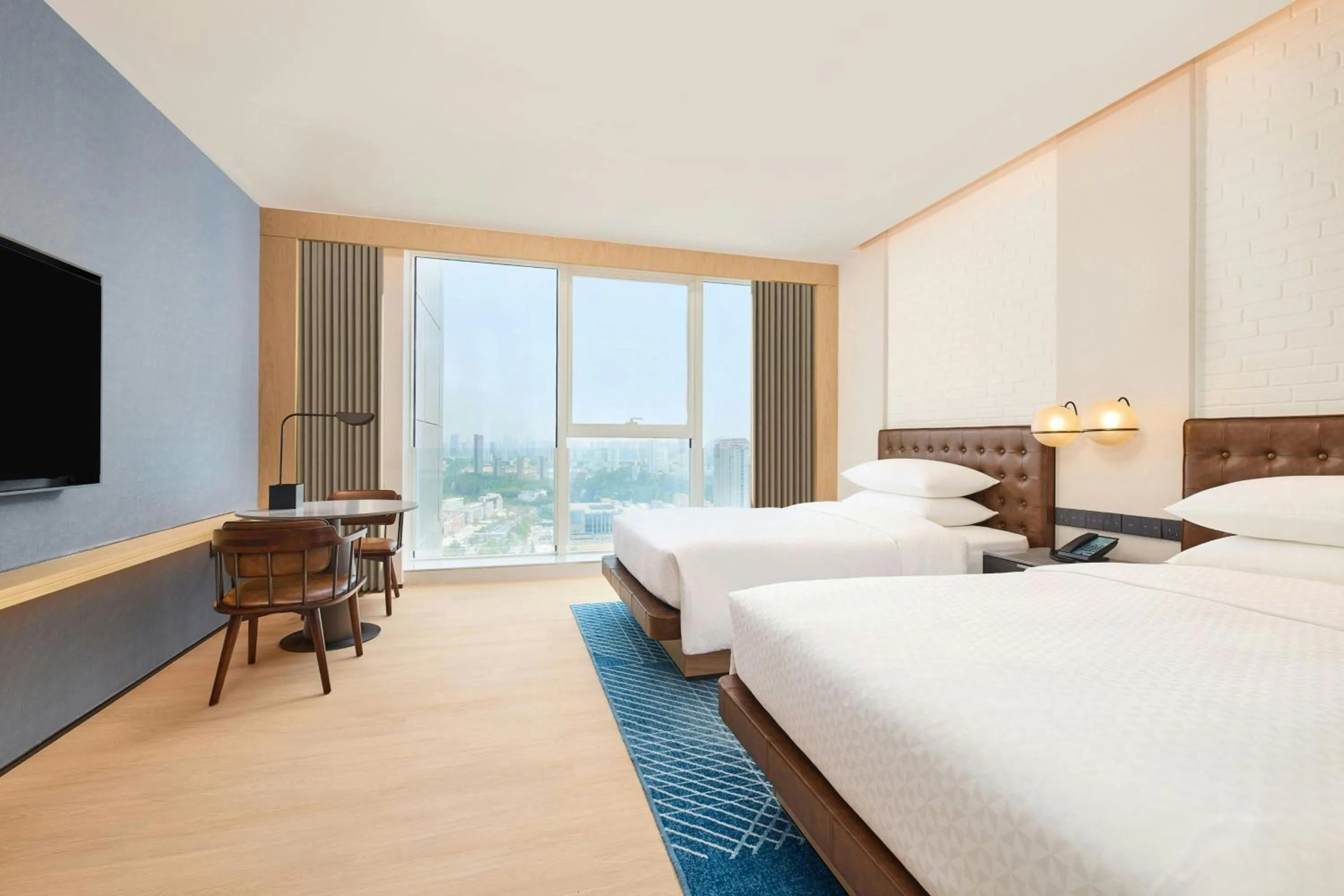 Photo of the whole room, Bed in Four Points by Sheraton Rizhao