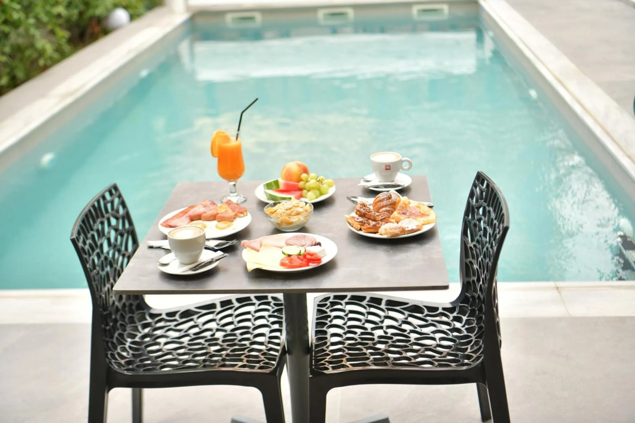 Swimming pool in Olympus Thalassea Boutique Hotel