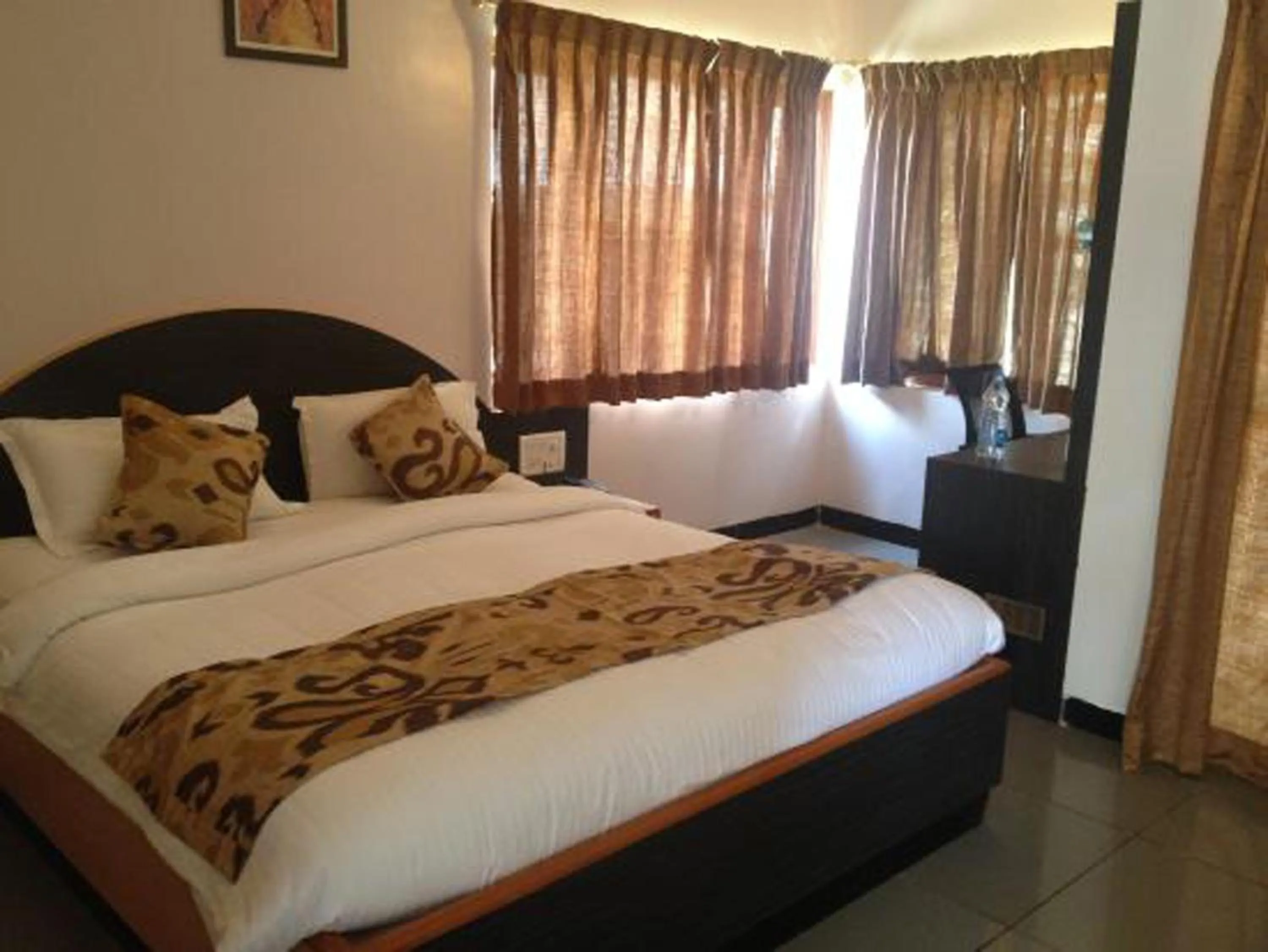 Bedroom in Cotton County Club and Resort