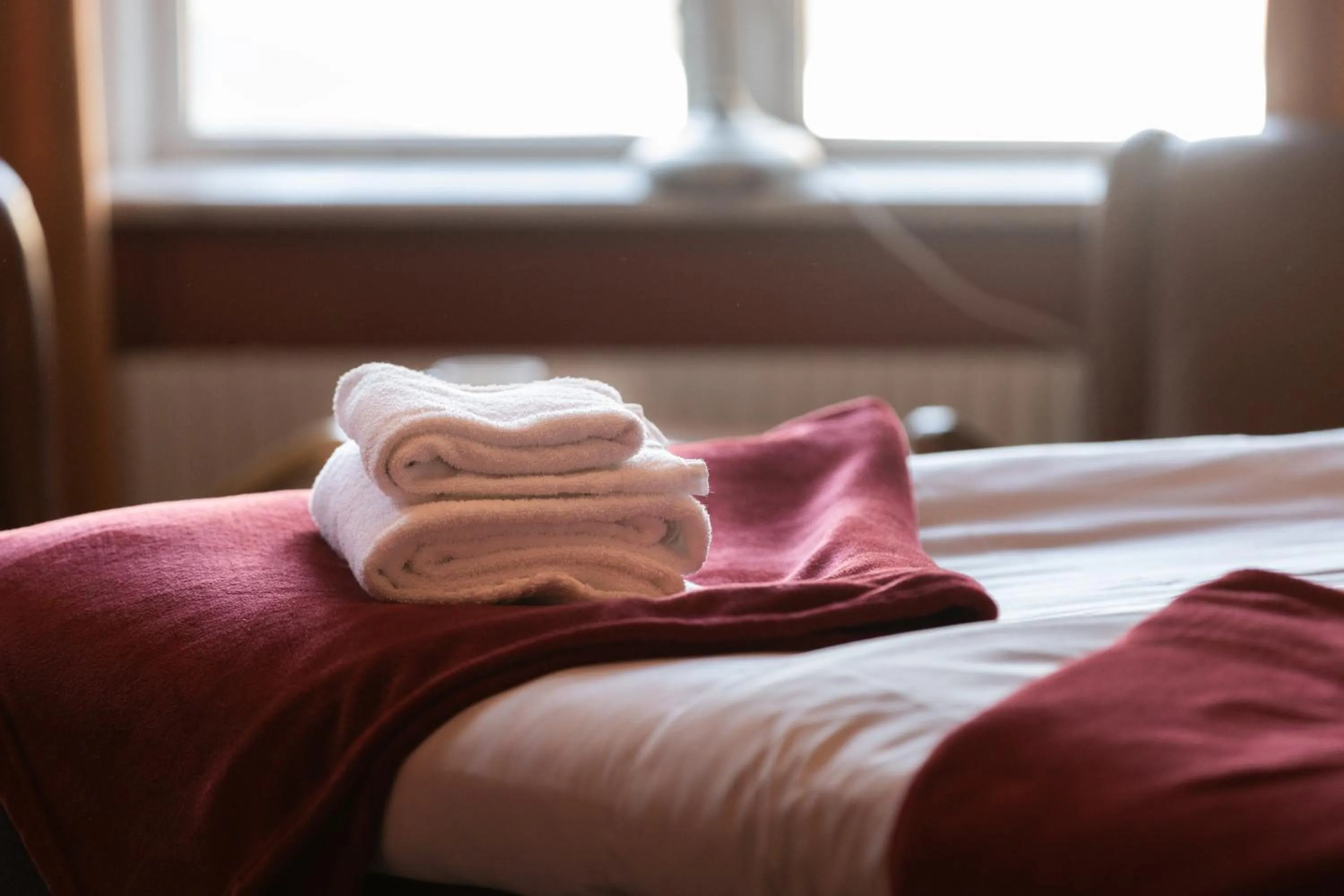 Bed in Cameo Boutique Hotell