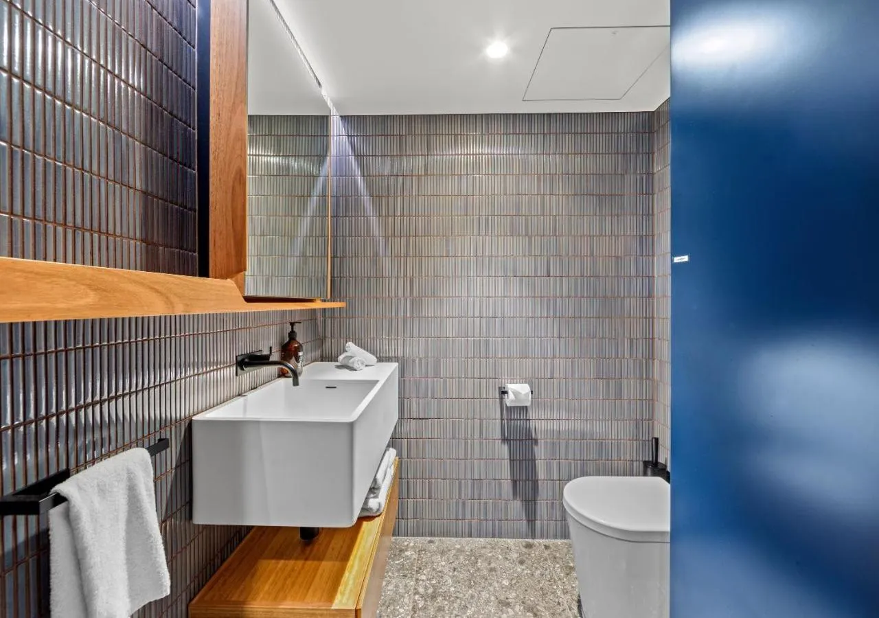 Bathroom in Spire Residences by CLLIX