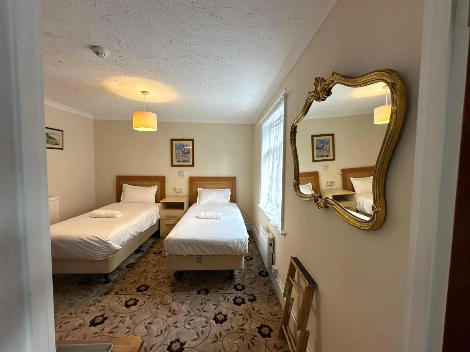 Bed in The Amara Inn