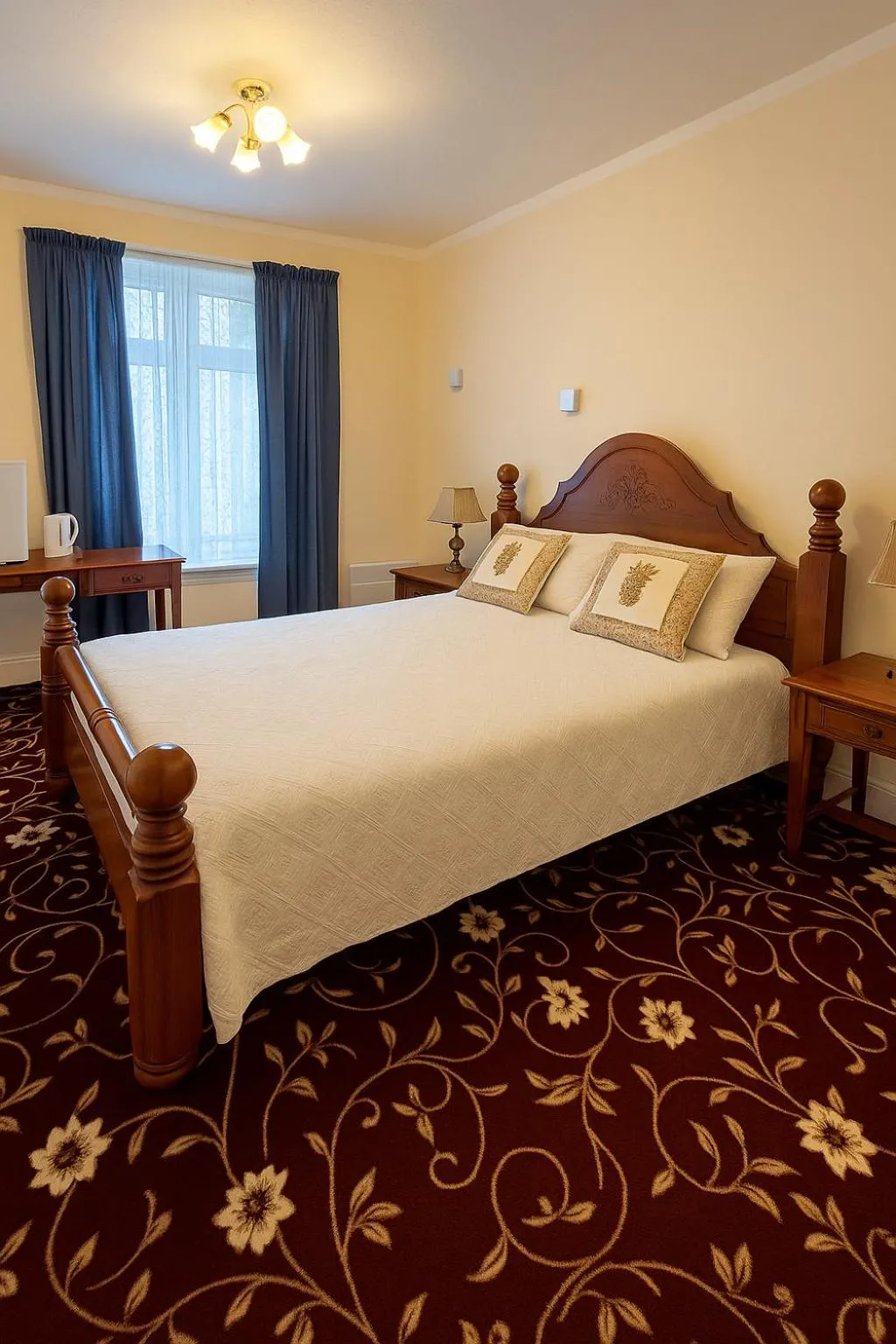 Bed in The Amara Inn
