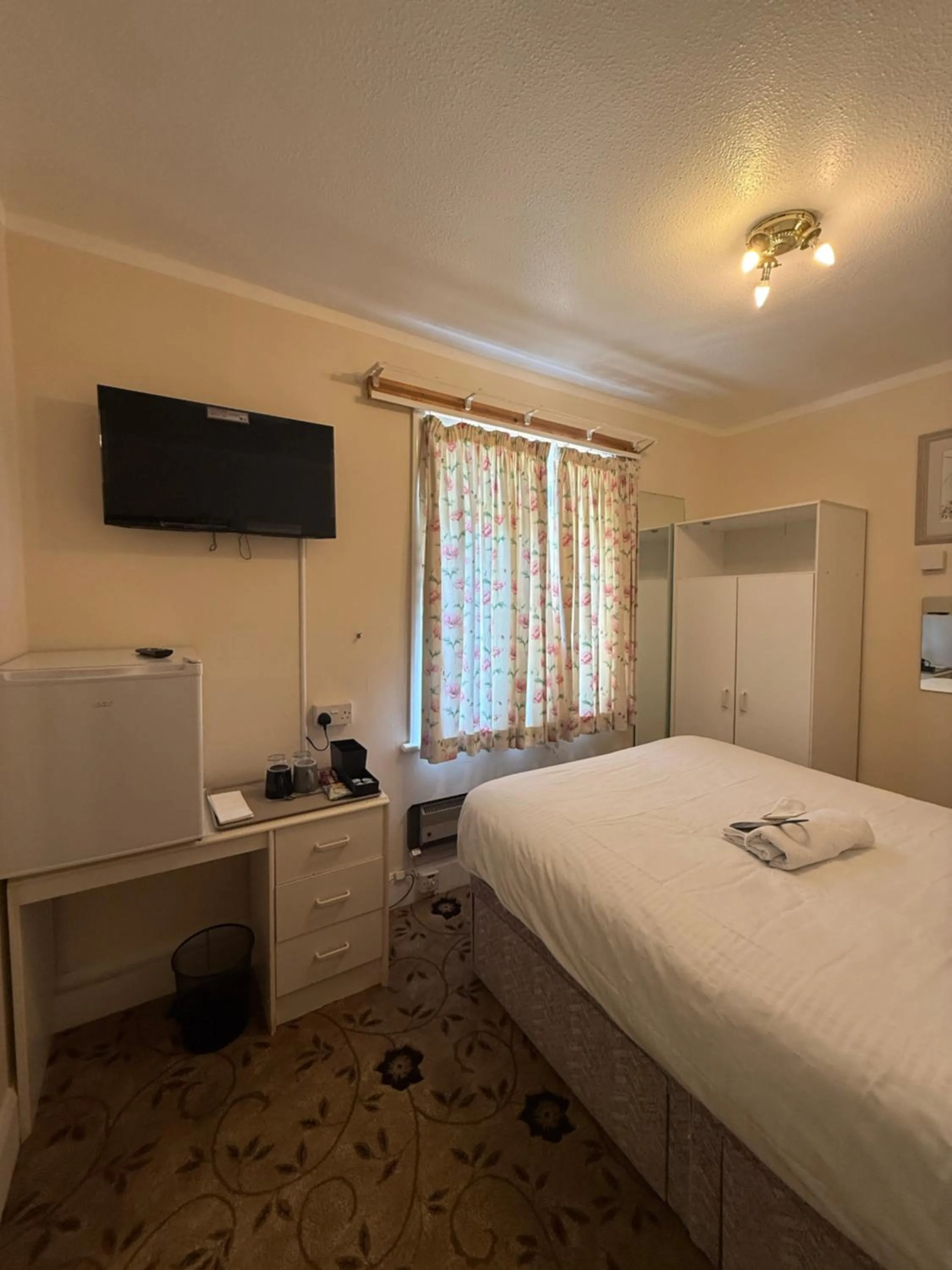Bed in The Amara Inn