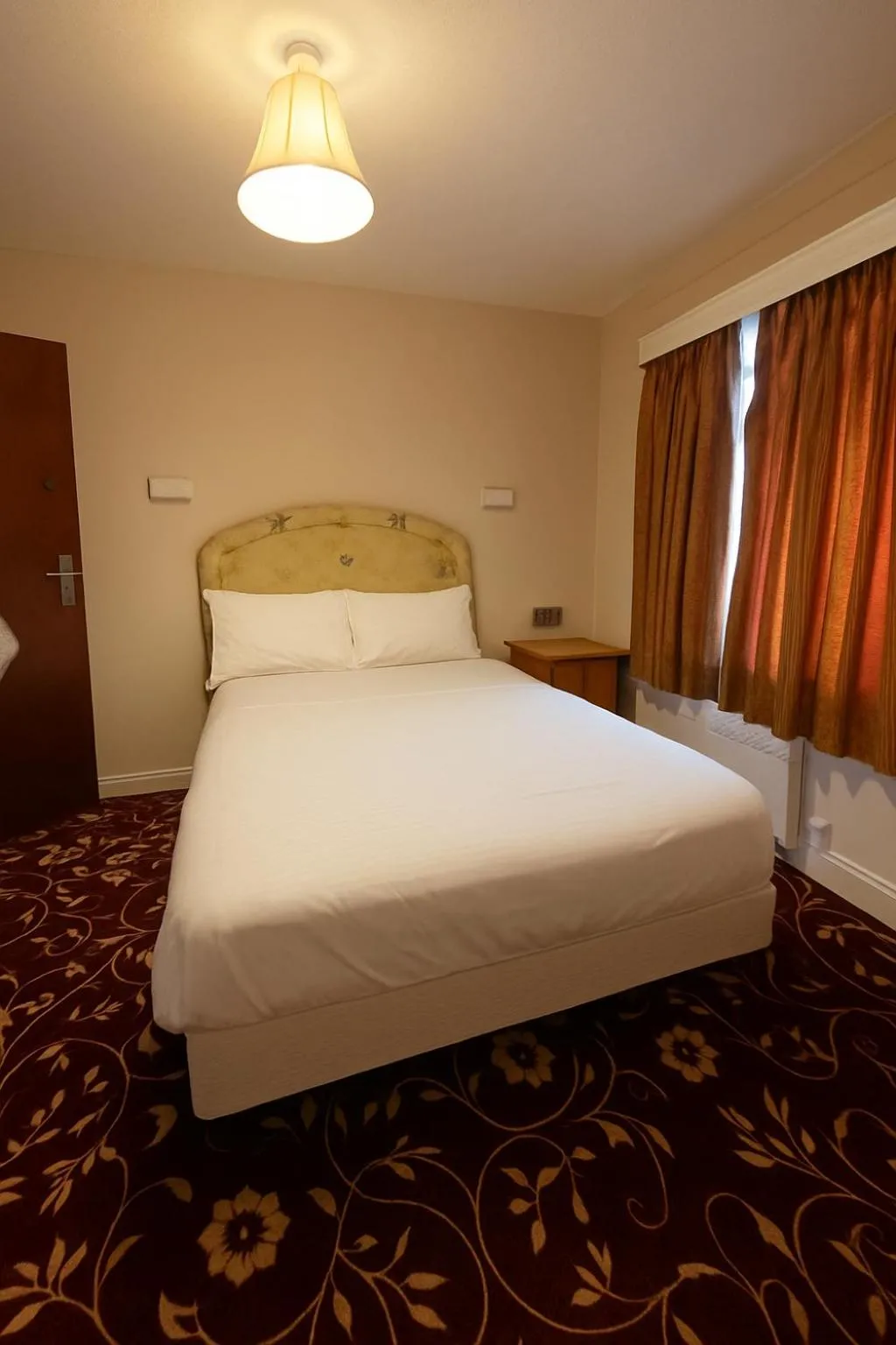 Bed in The Amara Inn