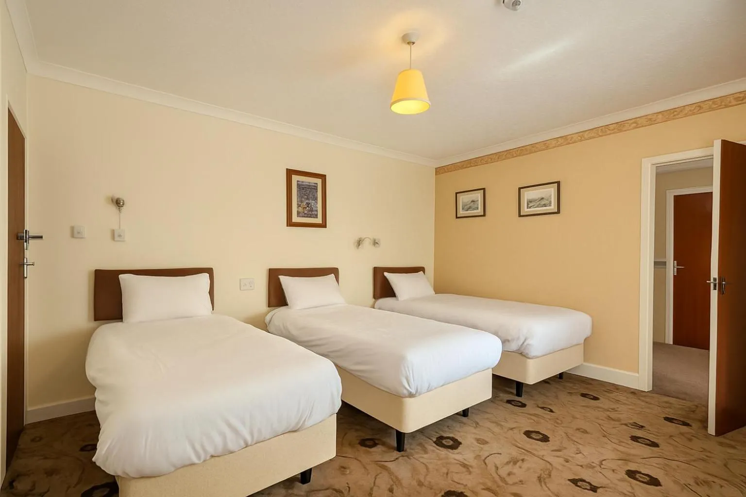 Bed in The Amara Inn