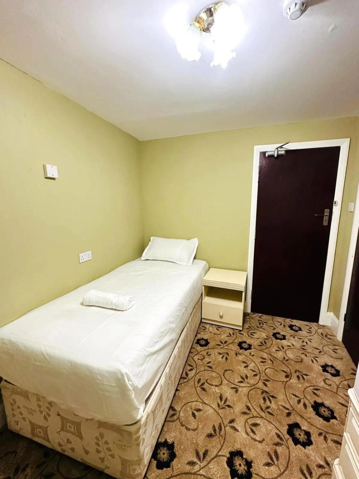 Bed in The Amara Inn