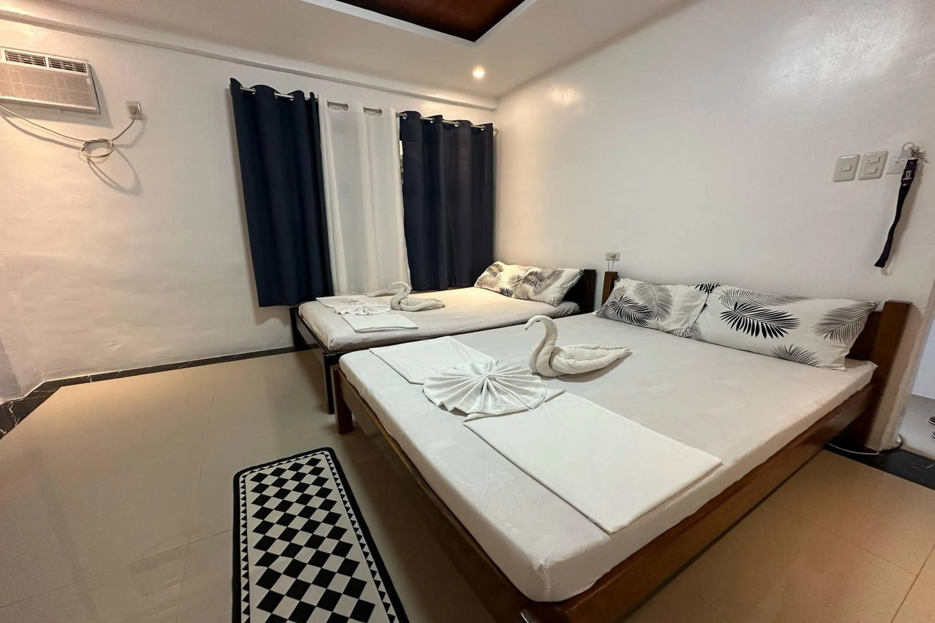 Bed in White-Beach Hideaway Resort Puerto Galera