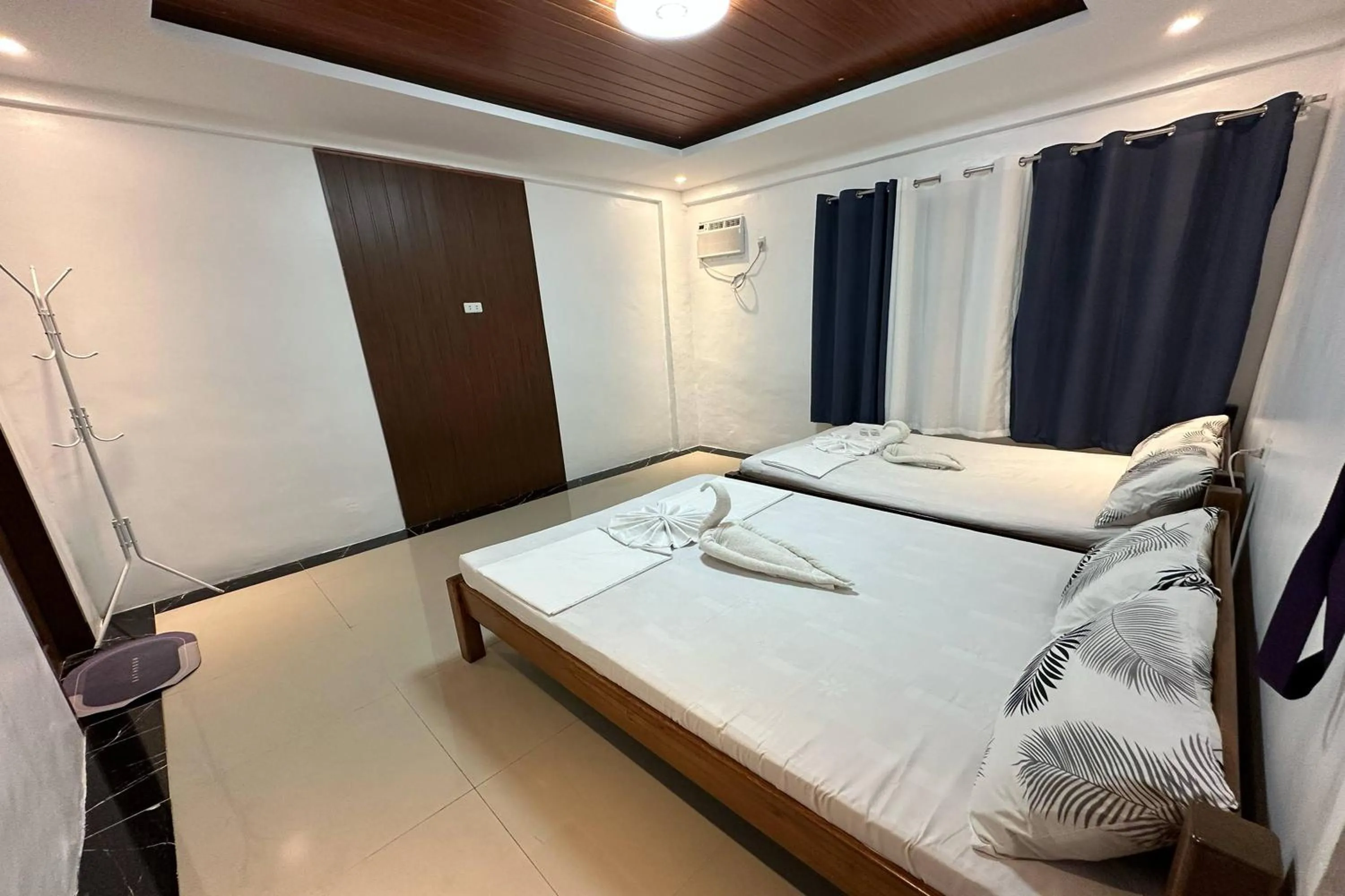 Bed in White-Beach Hideaway Resort Puerto Galera