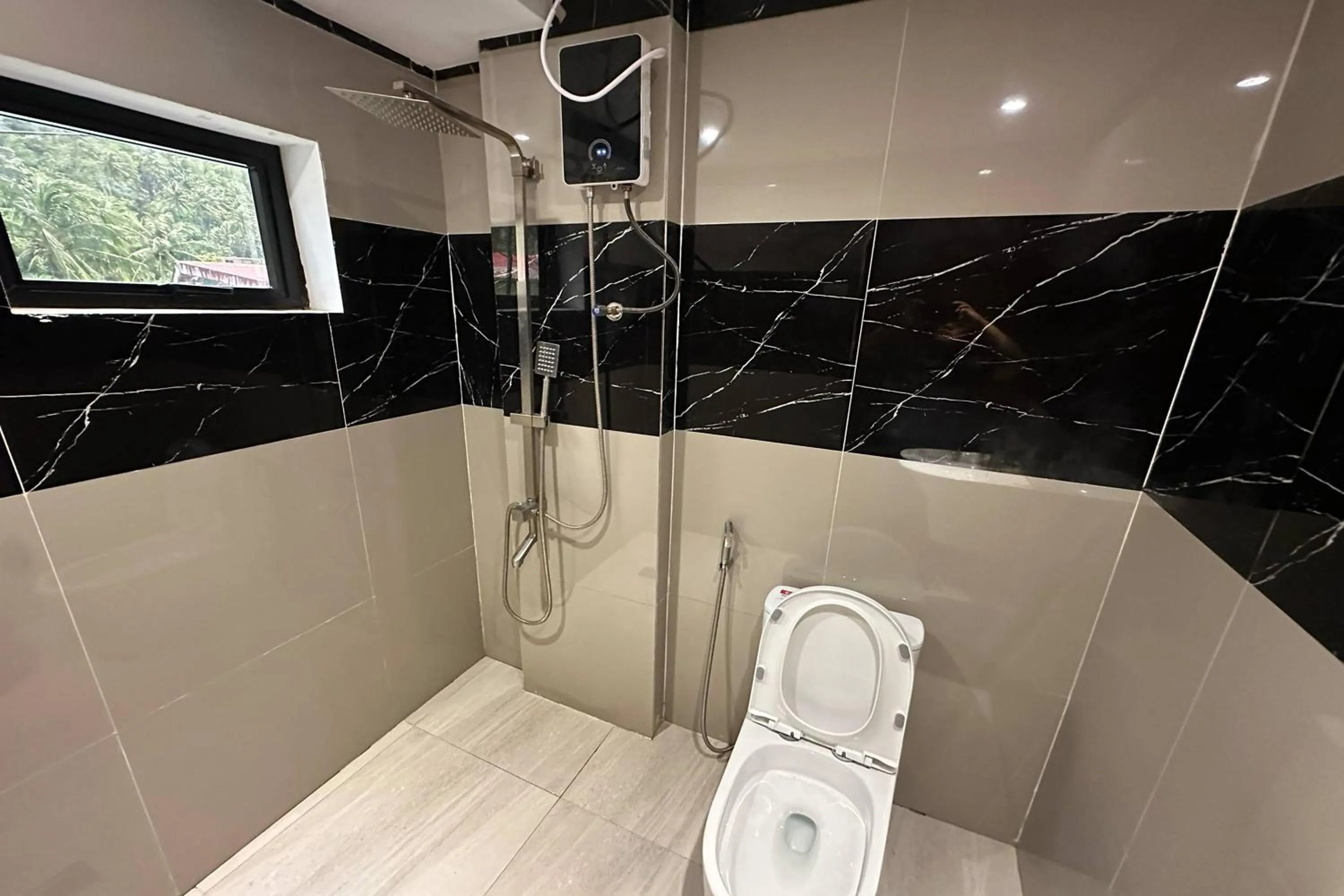 Bathroom in White-Beach Hideaway Resort Puerto Galera