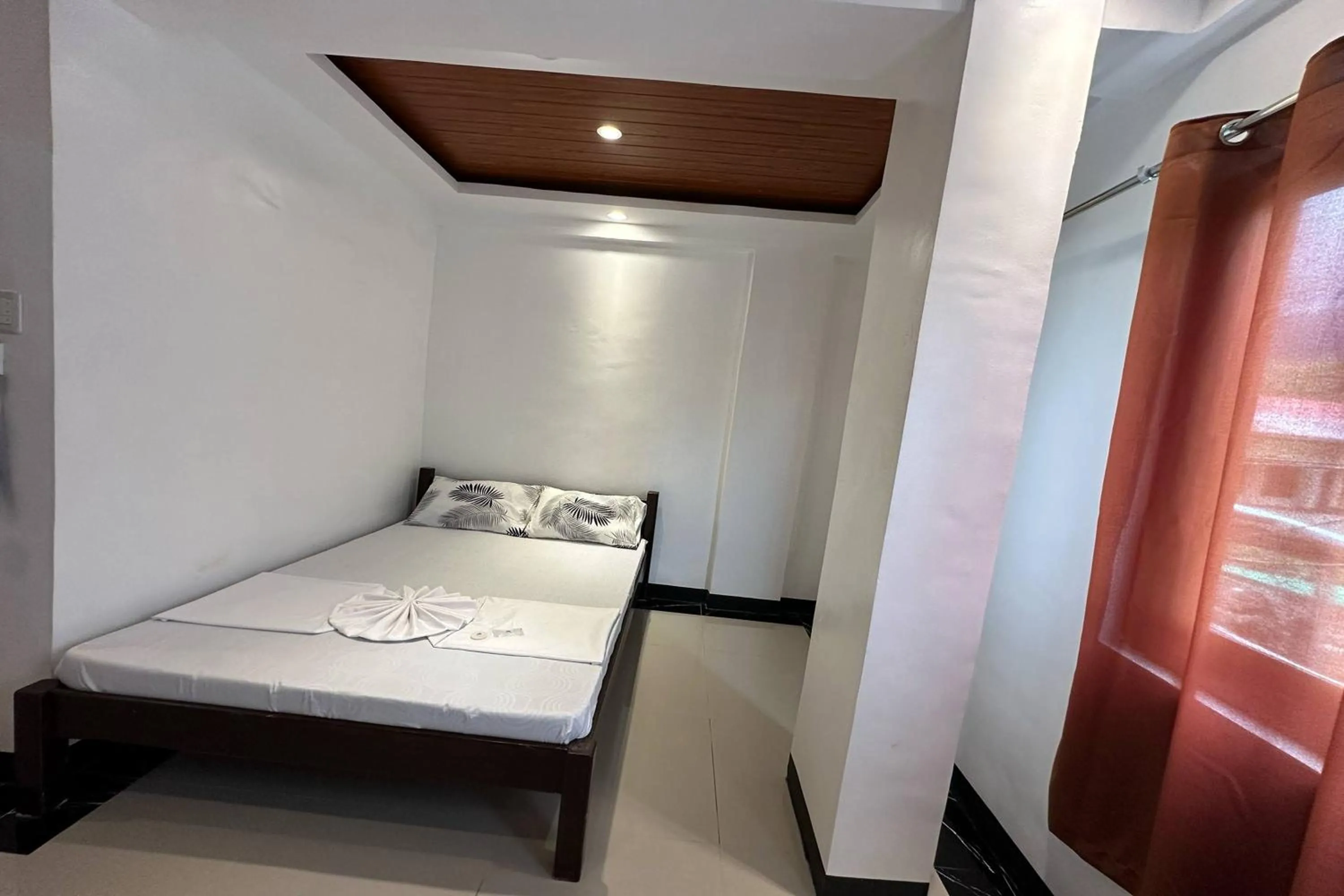 Bed in White-Beach Hideaway Resort Puerto Galera