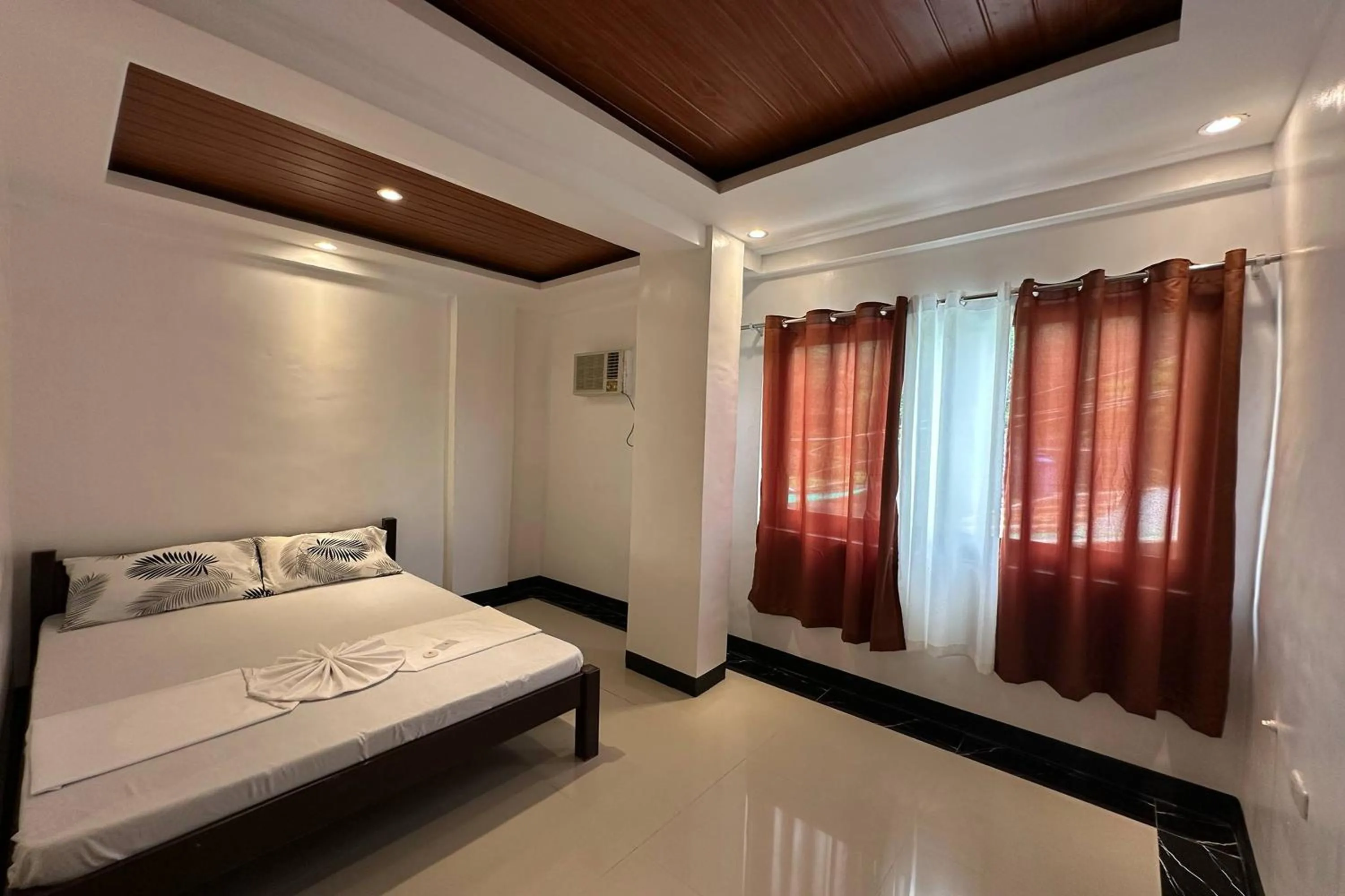 Bed in White-Beach Hideaway Resort Puerto Galera