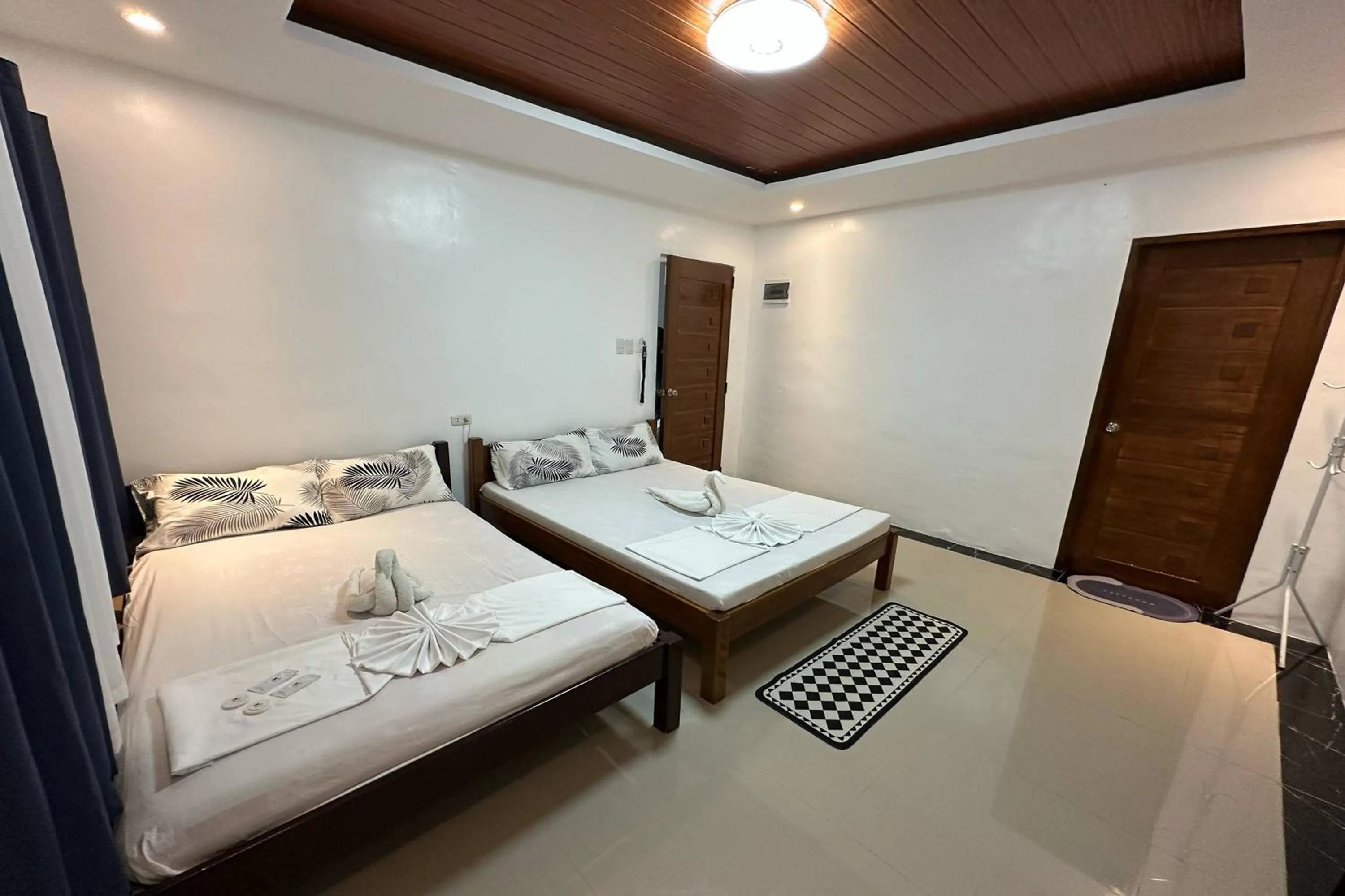 Bed in White-Beach Hideaway Resort Puerto Galera
