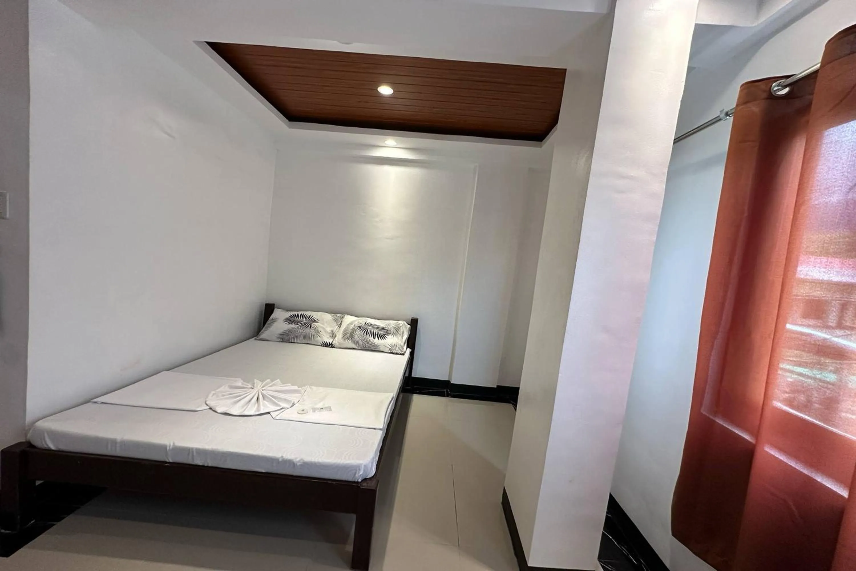 Bed in White-Beach Hideaway Resort Puerto Galera