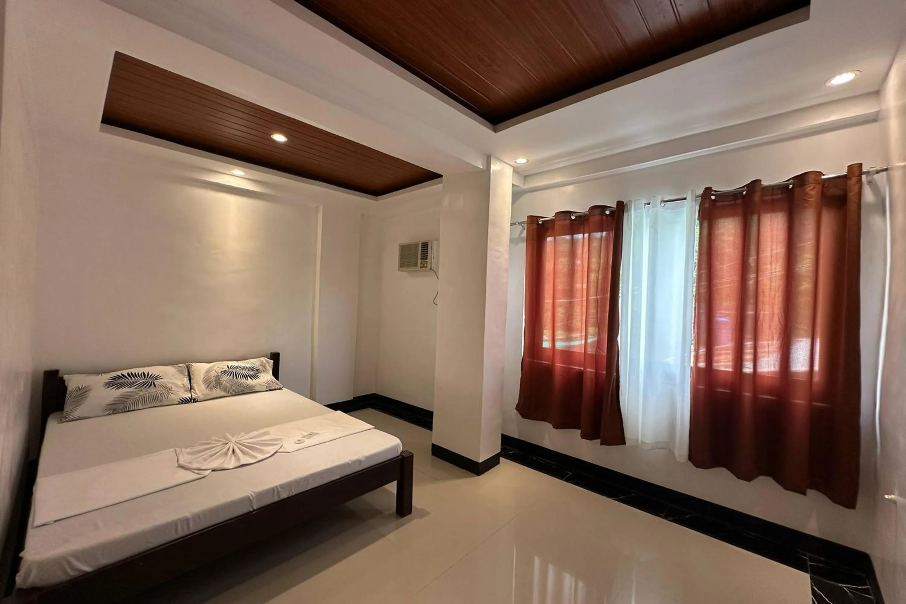 Bed in White-Beach Hideaway Resort Puerto Galera