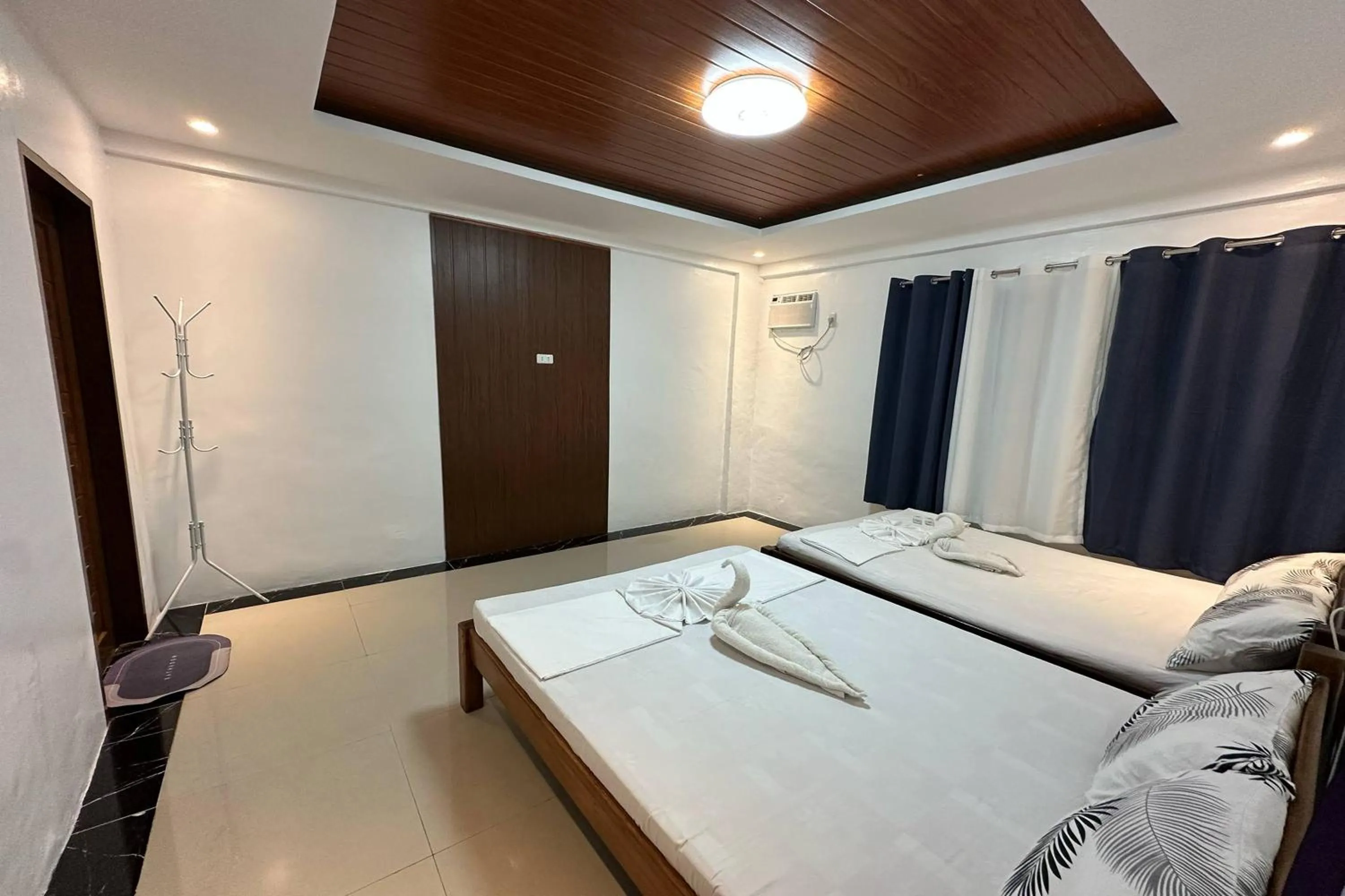 Bed in White-Beach Hideaway Resort Puerto Galera
