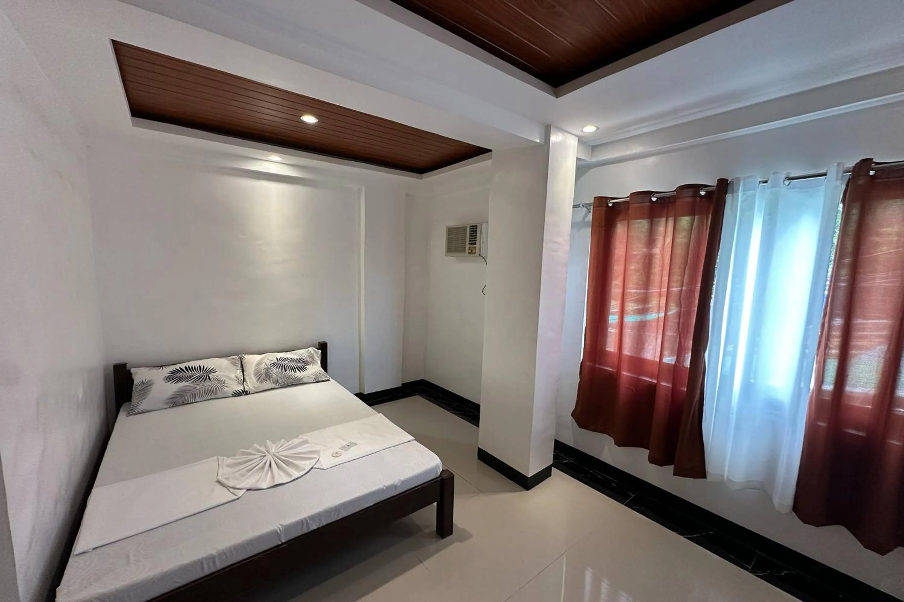 Bed in White-Beach Hideaway Resort Puerto Galera
