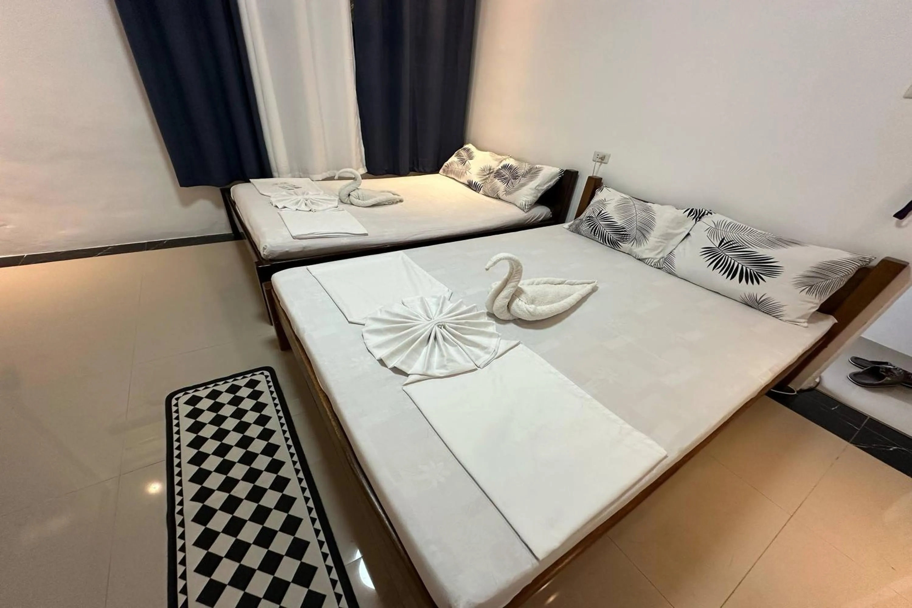 Bed in White-Beach Hideaway Resort Puerto Galera