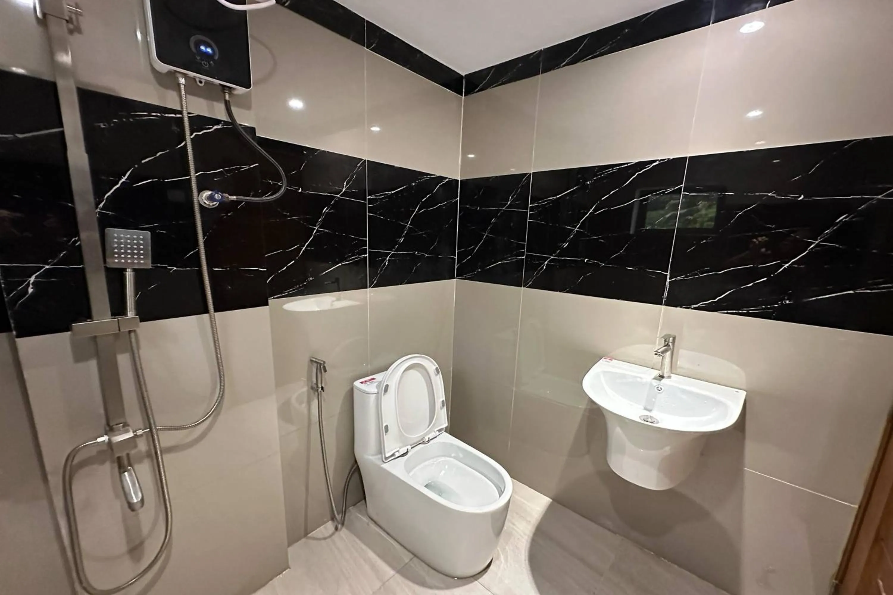 Bathroom in White-Beach Hideaway Resort Puerto Galera