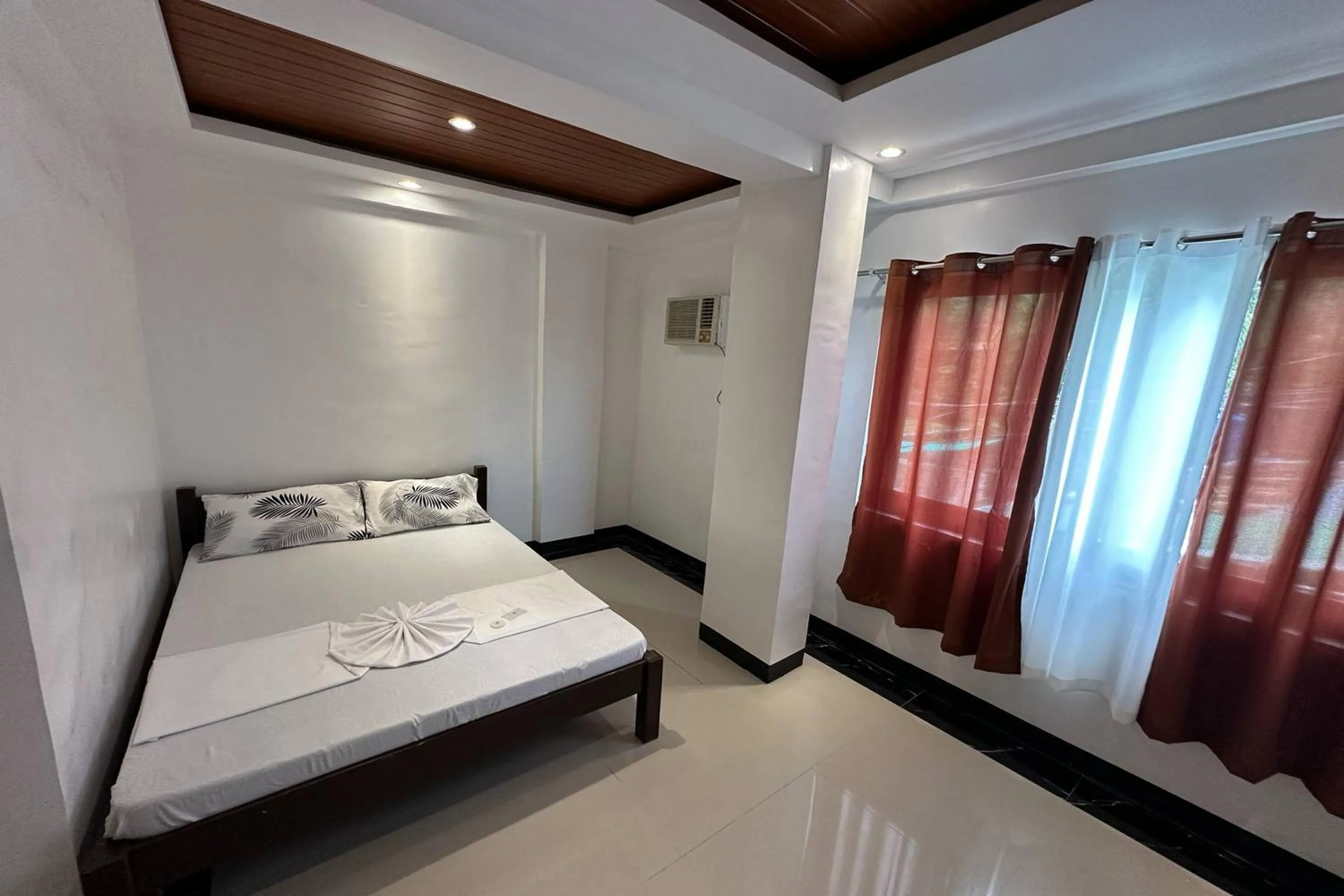 Bed in White-Beach Hideaway Resort Puerto Galera