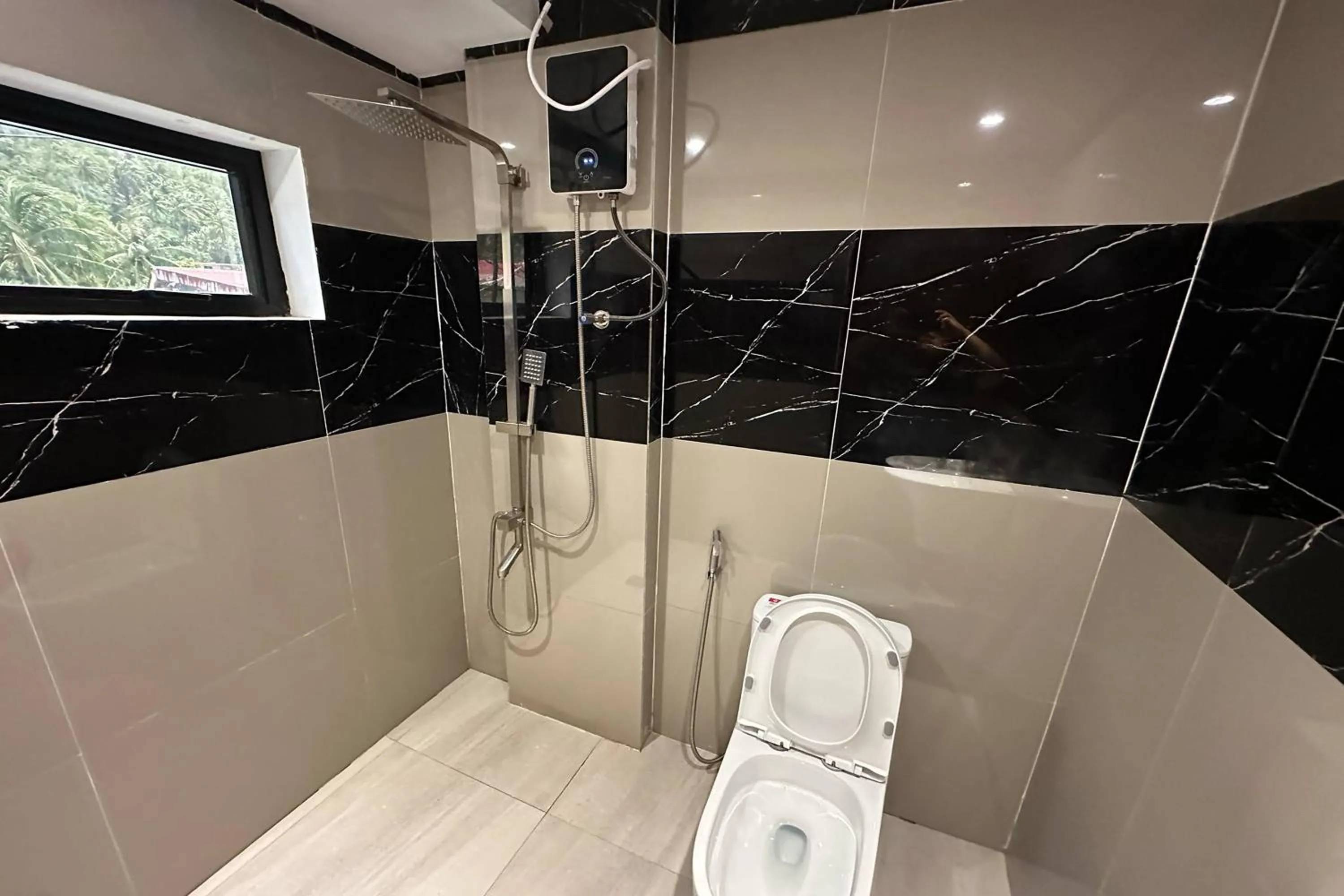 Bathroom in White-Beach Hideaway Resort Puerto Galera